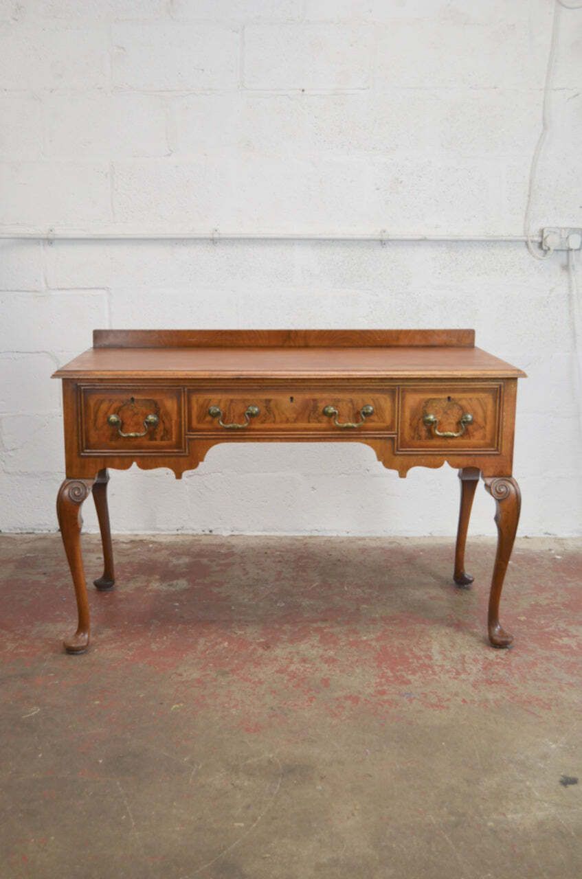 Waring & Gillow   A Queen Anne Revival Walnut Writing Table Desk