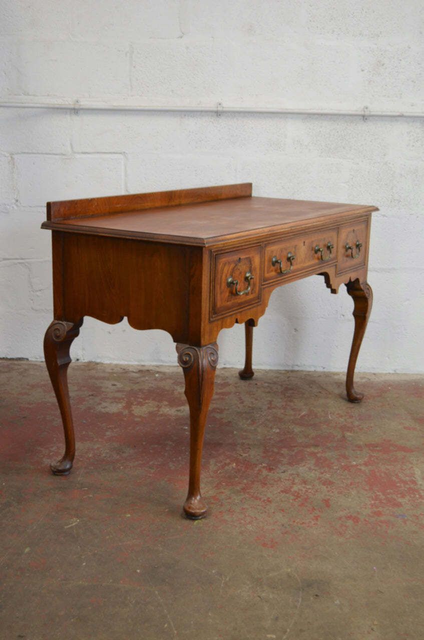 Waring & Gillow   A Queen Anne Revival Walnut Writing Table Desk photo for sale