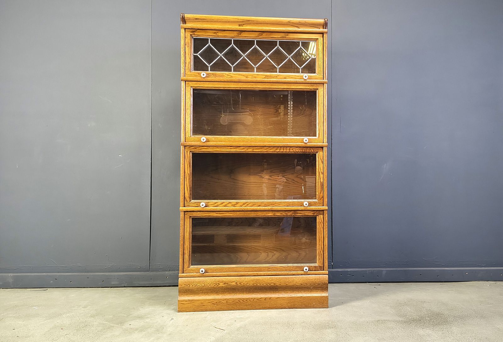 photo furniture Four Tier Oak Barrister Style Bookcase With Leaded Glass
