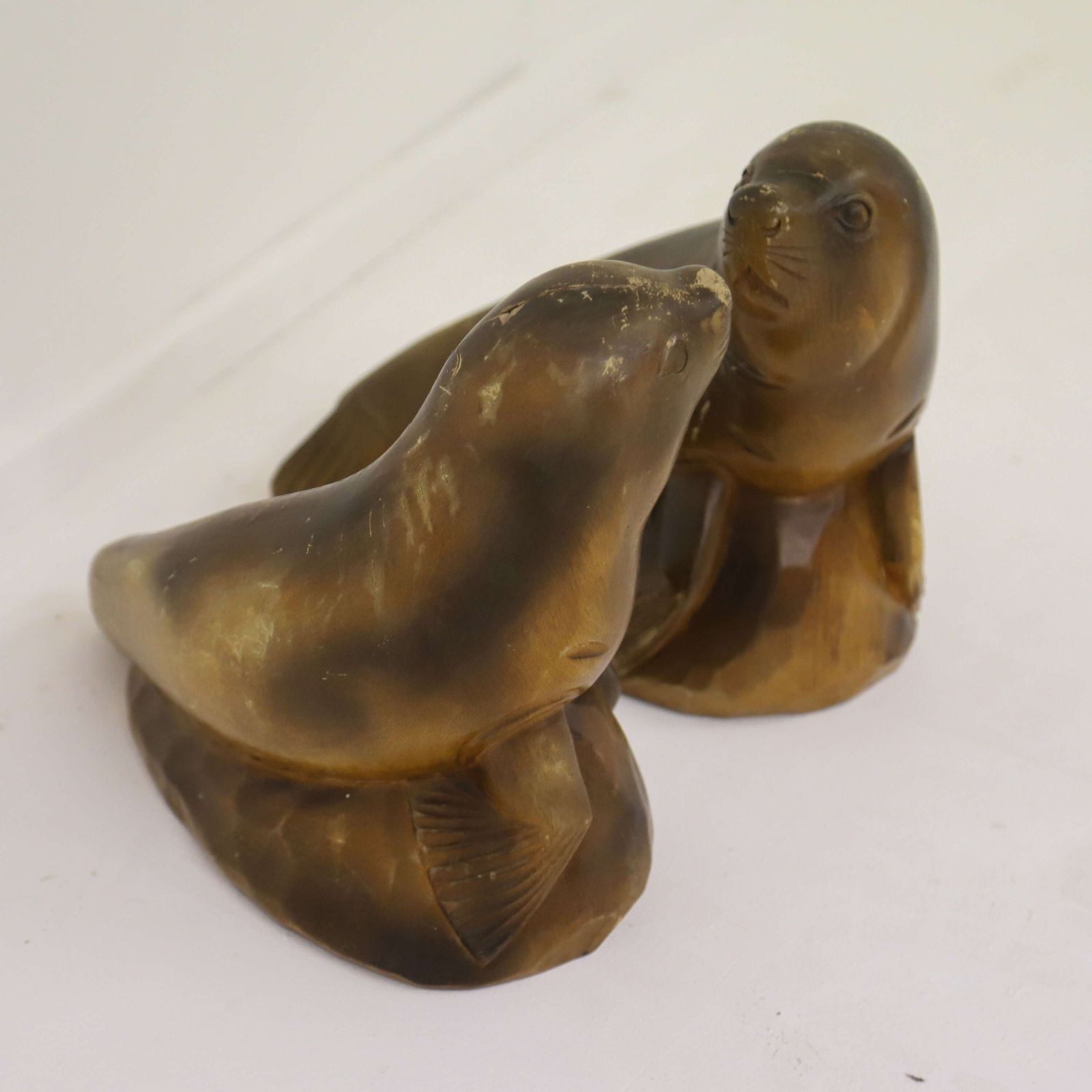 photo vinterior Highly Decorative Pair Of Mid‑Century Seal Sculptures   1950s Carved Figures