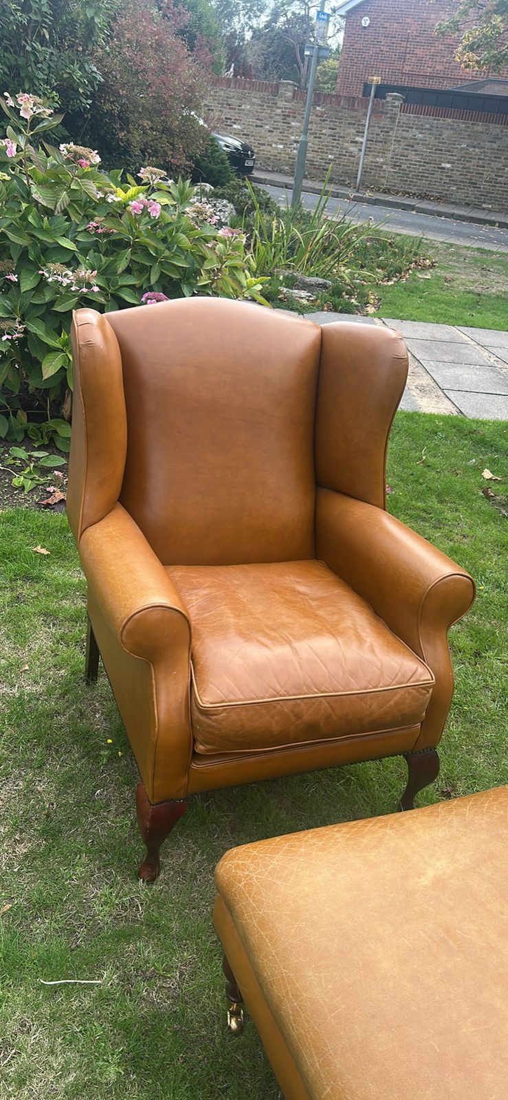Tan Leather Southwold Vintage Laura Ashley Wingback Chair And Matching Footstool photo furniture