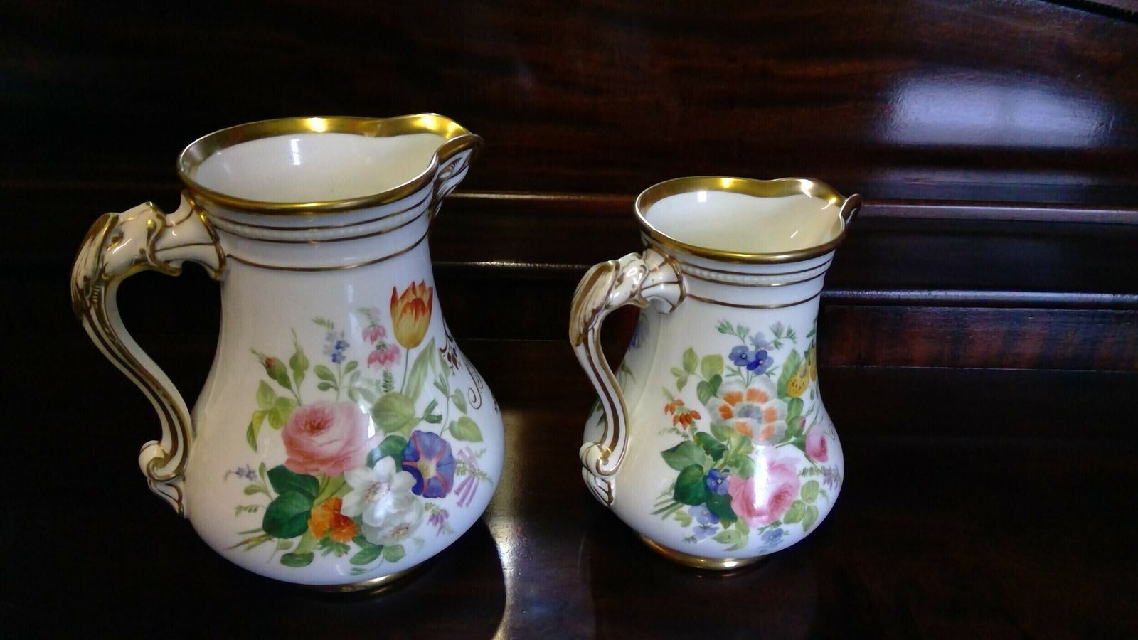 A Fine Quality Pair Of Rockingham Coalport Porcelain Botanical Floral Decorated Marriage Jugs Highlighted In Giltwork Dated 1860 photo for sale