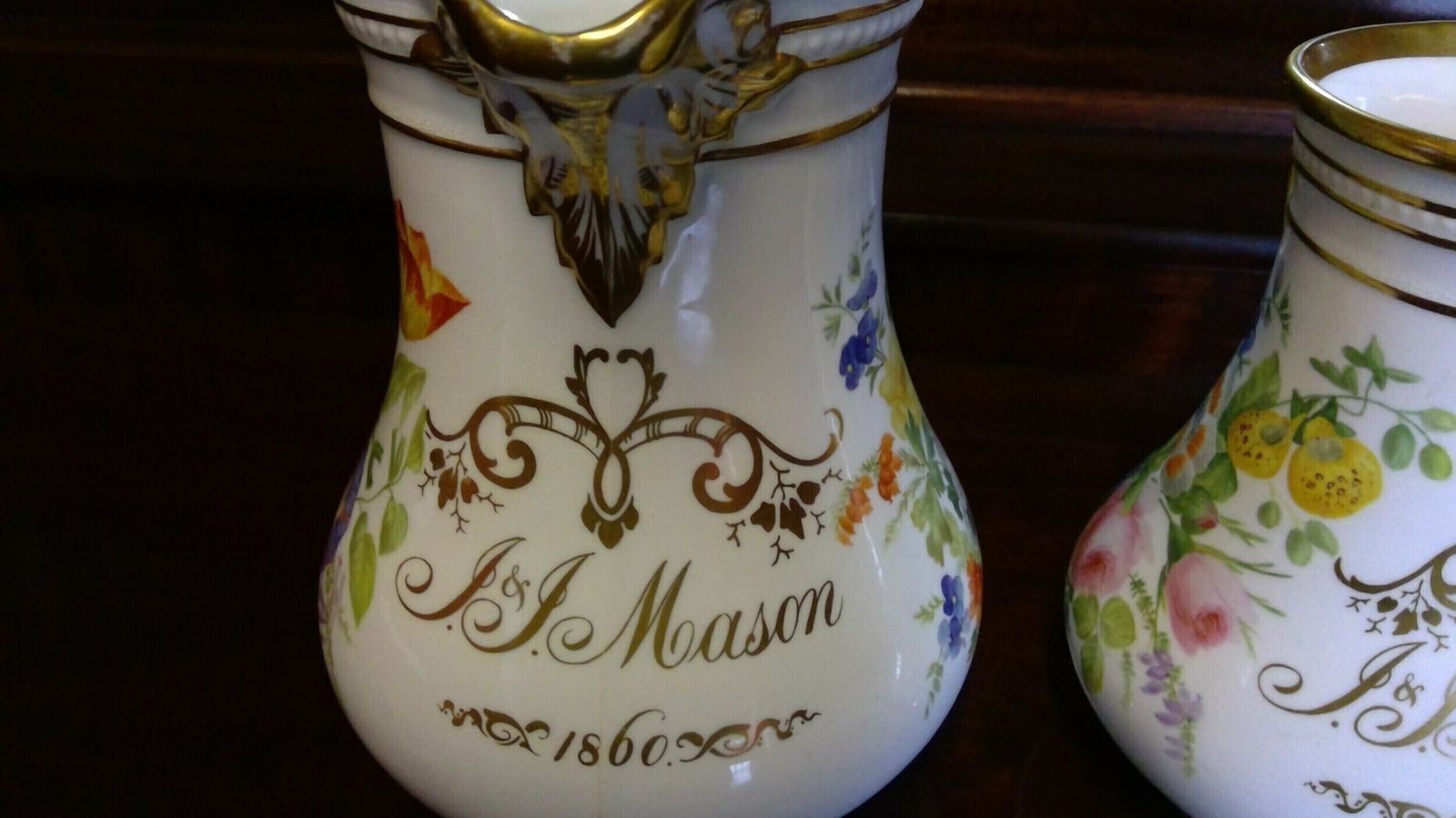 A Fine Quality Pair Of Rockingham Coalport Porcelain Botanical Floral Decorated Marriage Jugs Highlighted In Giltwork Dated 1860 photo 180.0