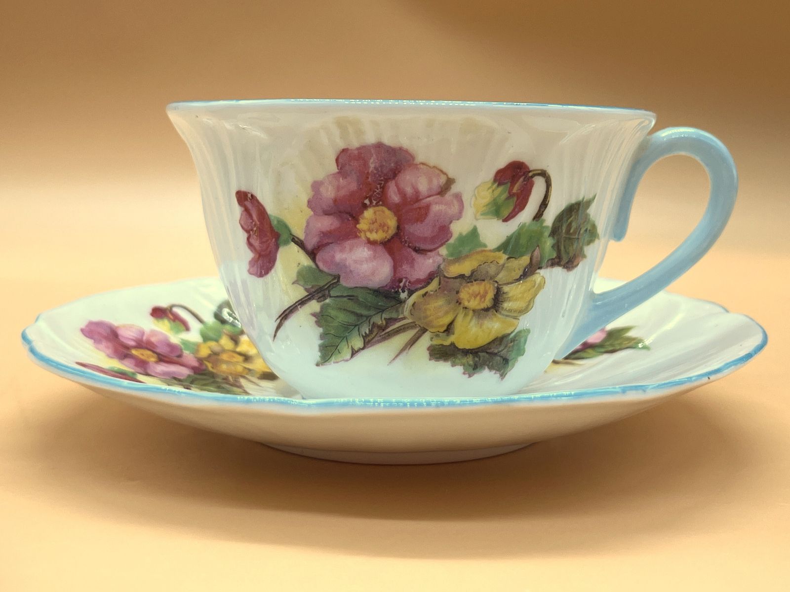 photo furniture Vintage Shelley China Begonia Blue Trim Design Oleander Shape Cup And Saucer Duo. C1940. 13427.