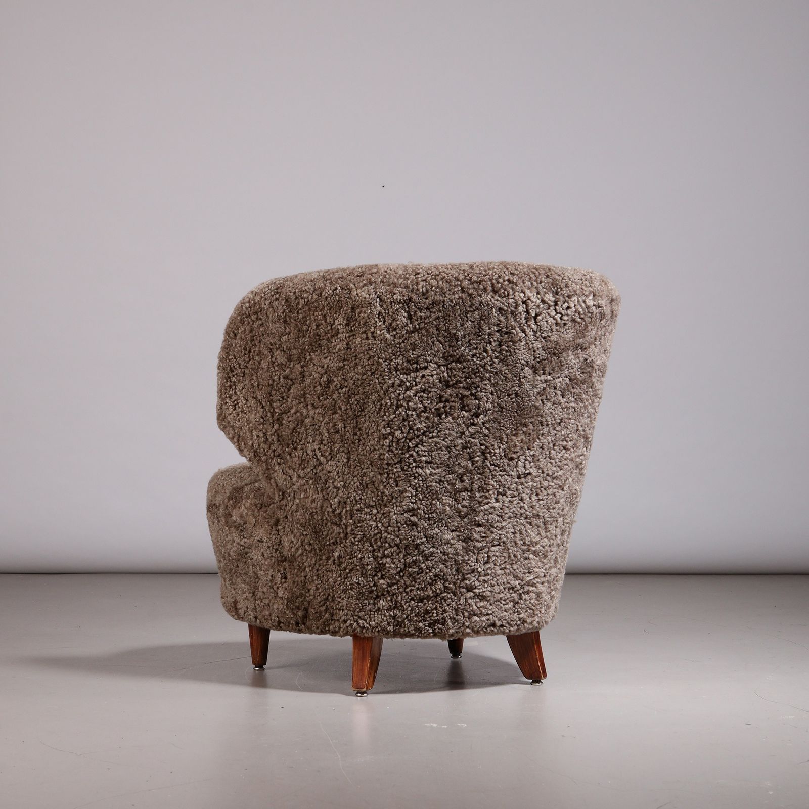 Carl Johan Boman Finnish Curved Easy Chair In Sahara Sheepskin, 1940s photo for sale