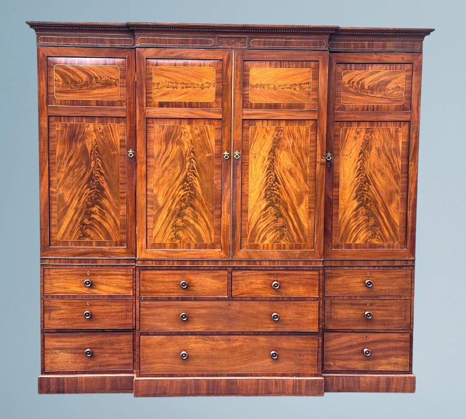 A Large Regency Figured Mahogany Breakfront Wardrobe With Brass Inlaid Decoratio photo Furniture