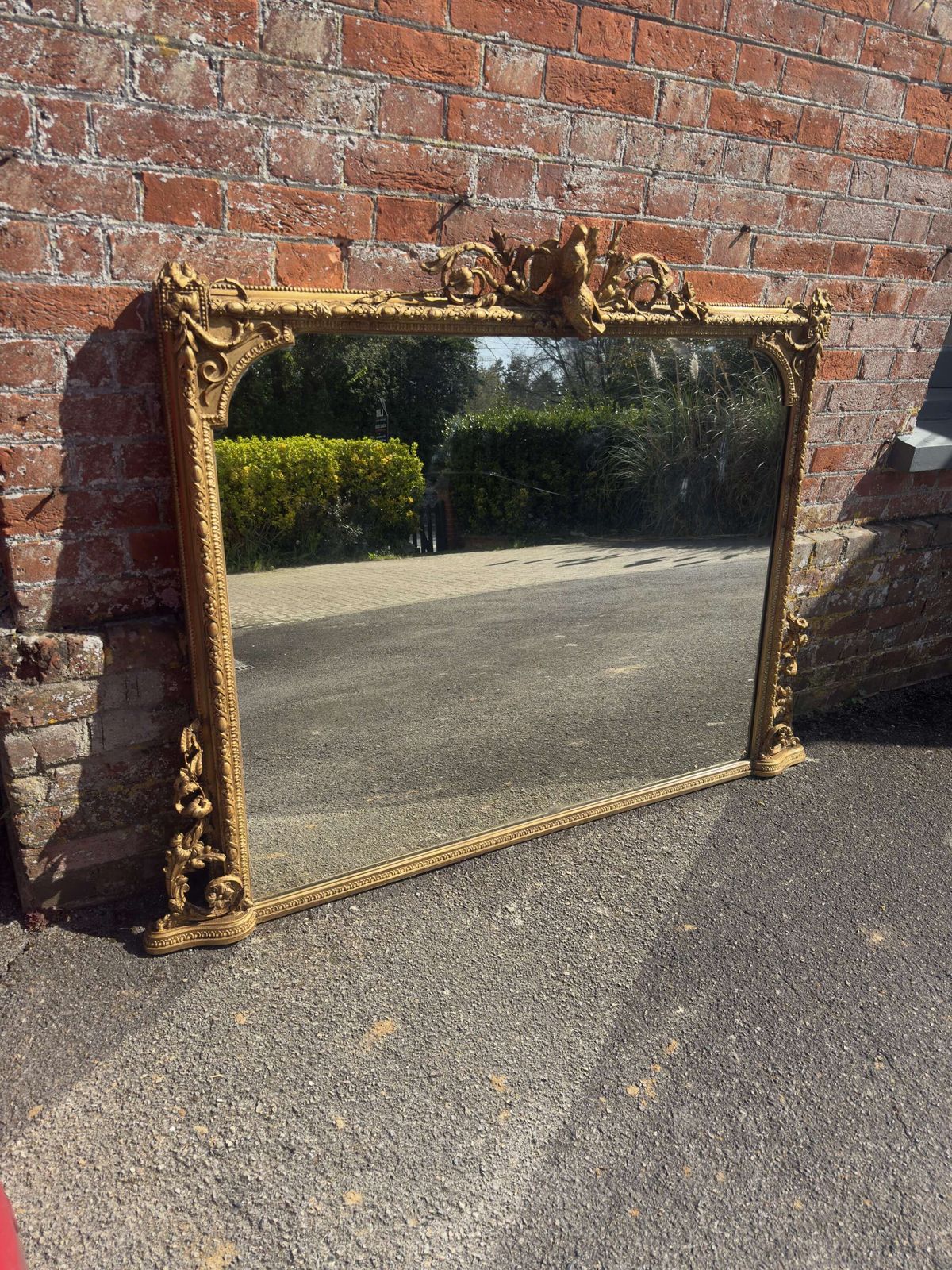 A Highly Impressive Large Antique English 19th Century Gilt Overmantle Mirror.