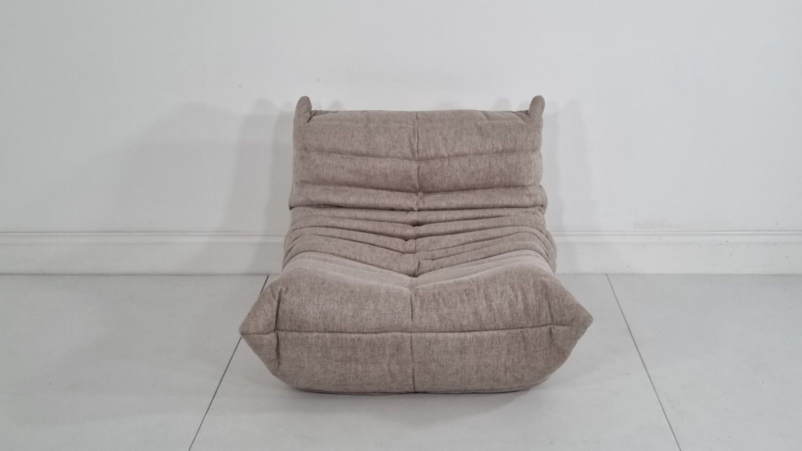 photo furniture Ligne Roset Togo Chair In Cream/Honey Woven Fabric In Excellent Condition