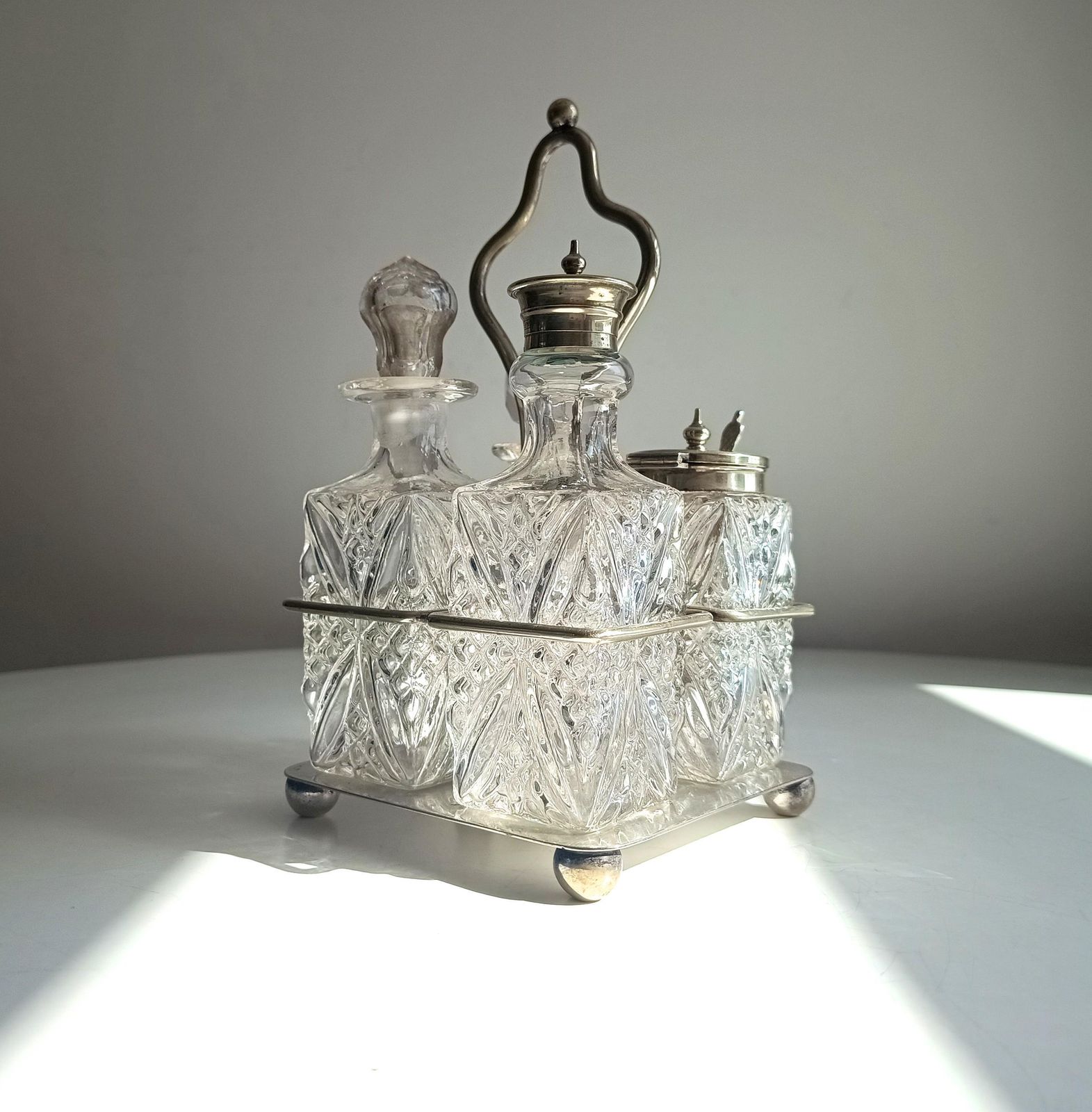 photo furniture Antique Silver Plate Cruet Stand & 4 Cut Glass Condiment Bottles, England, Circa 1915