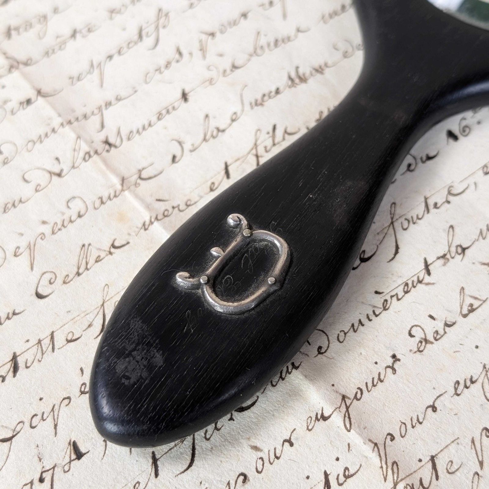 Antique Ebonised Wood Hand Mirror With Silver Initial D, Late 19th Century Black Oval Victorian Beveled Glass Vanity Accessory, photo for sale