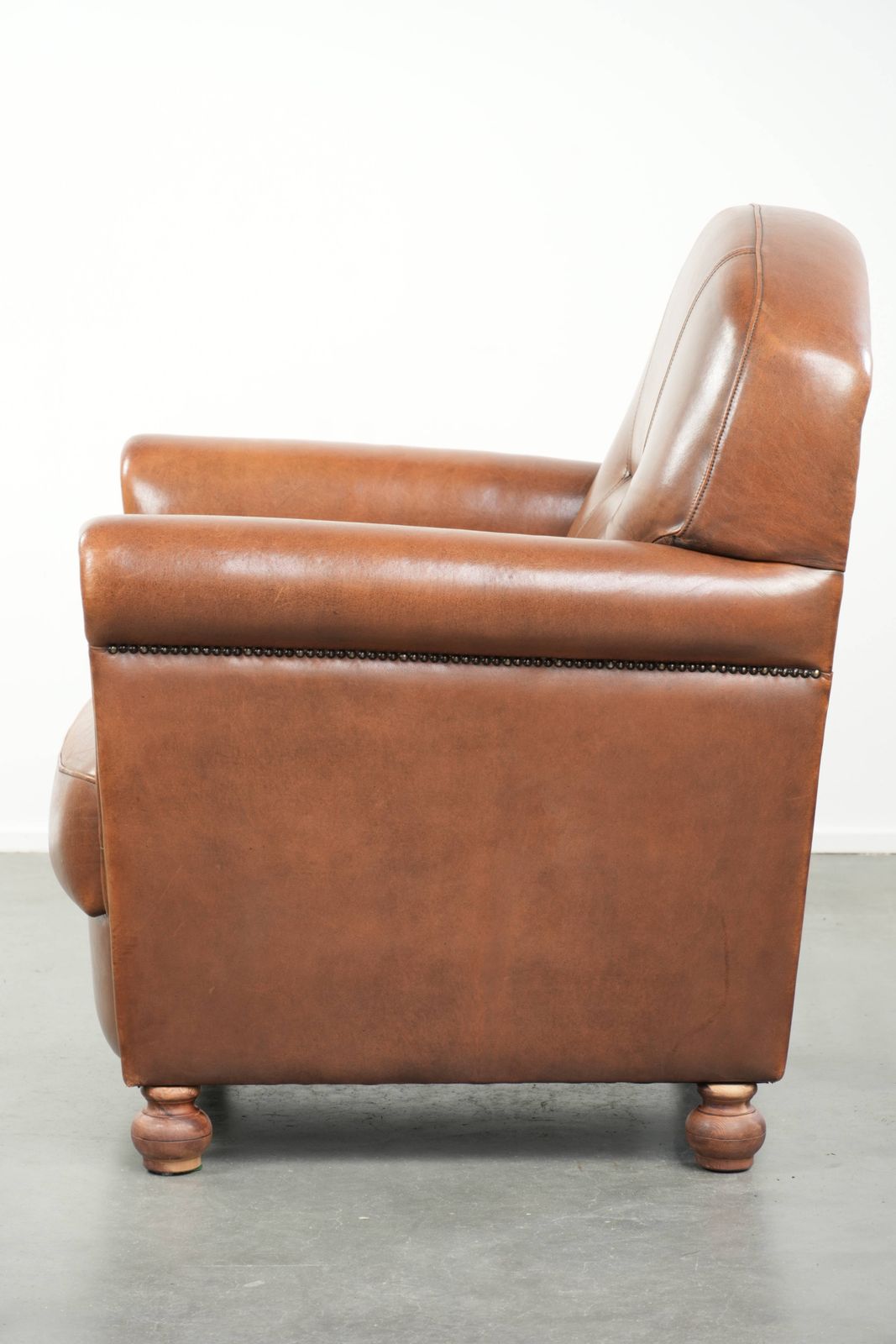 Beautiful, Stately Armchair In Good Condition, Made Of Sheepskin With A Refined Finish Featuring Decorative Nails. photo 1053.0