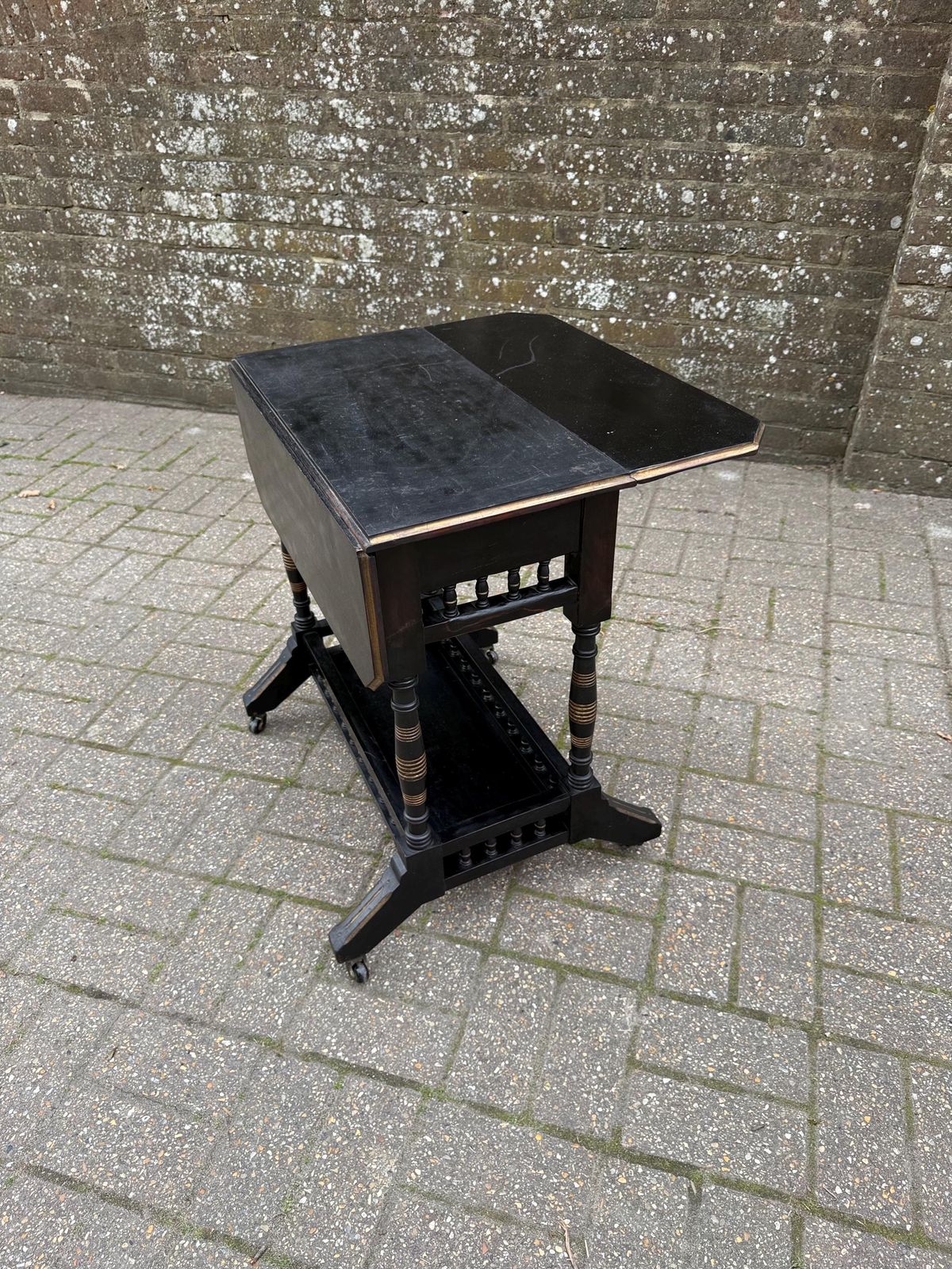 photo furniture Vintage Chinoiserie Oriental Style Drop Leaf Table, Early 20th Century Ebonised Folding Side Table, Victorian Style On Castors