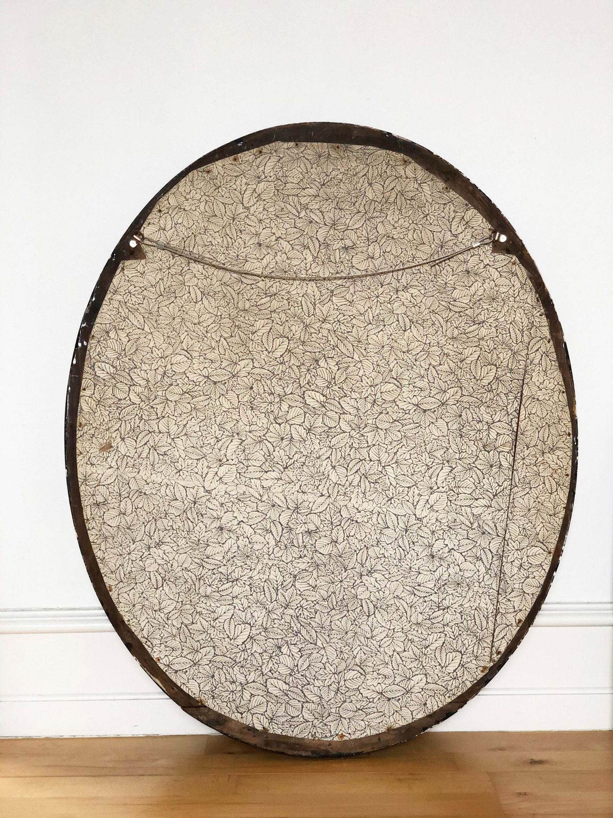 photo for sale Large Antique French Louis Philippe Oval Mirror – Black And Gold, Late 19th Century