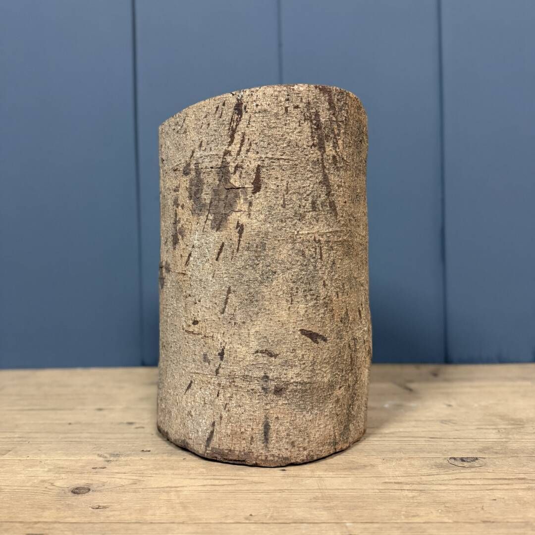 Head Of A Bearded Man Carved From A Wooden Trunk photo vinterior
