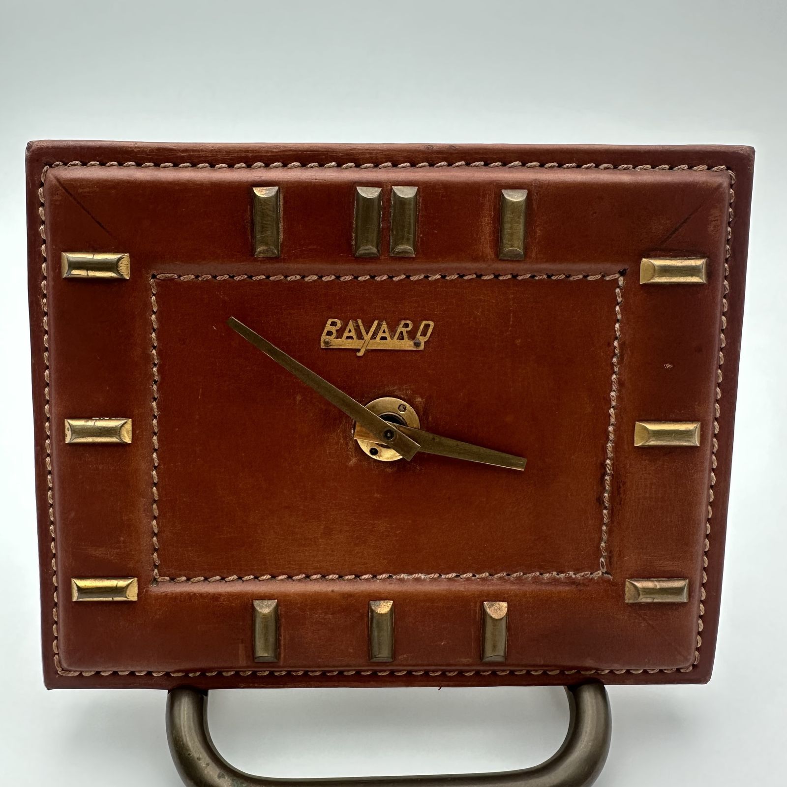 photo furniture Bayard Desk Clock In Leather Covered Brass – France, 1953