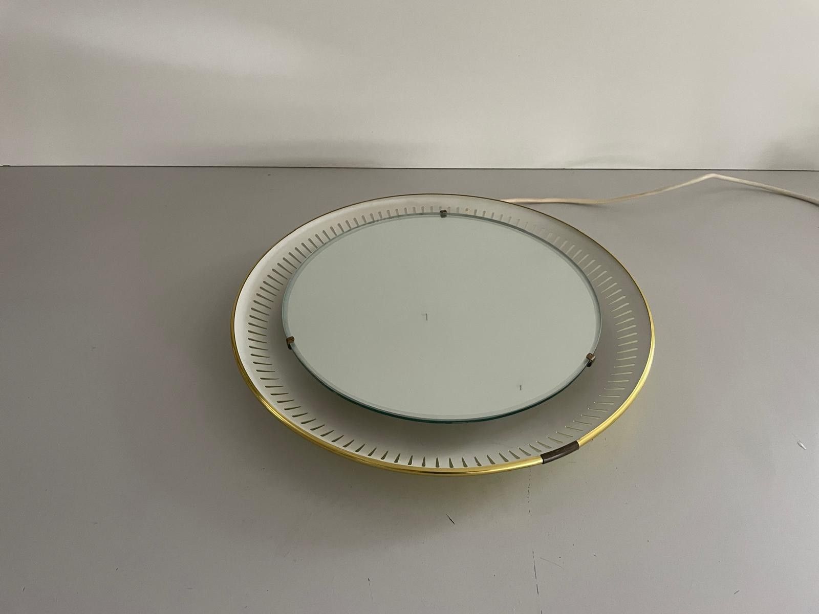 photo for sale Mid Century Round Yellow And White Wall Mirror With Light By Hillebrand, 1950s