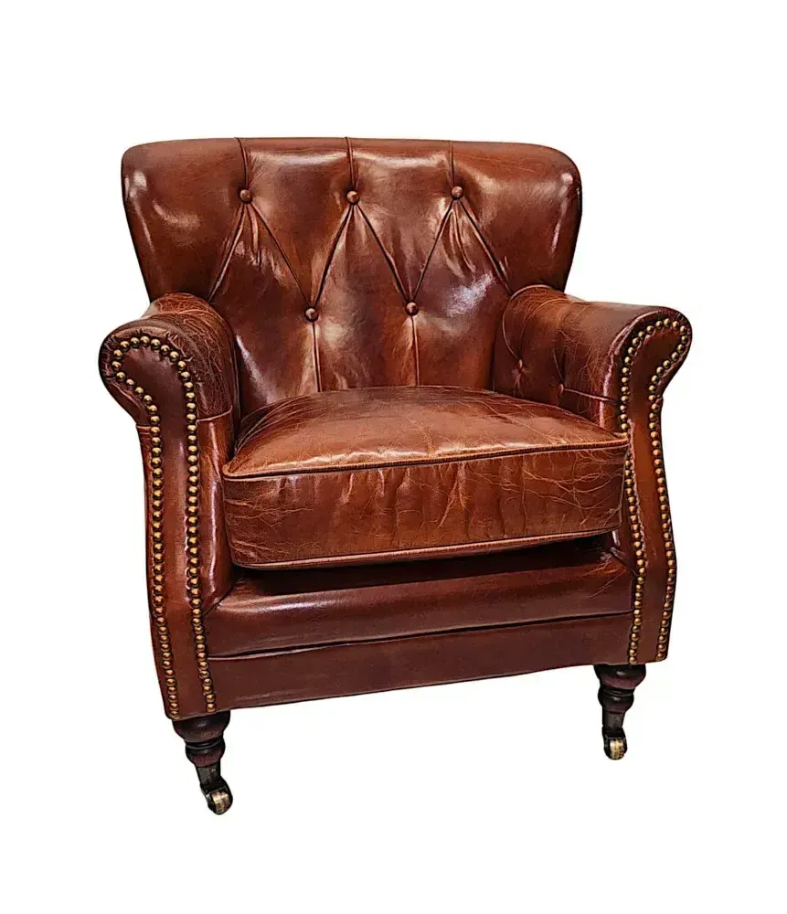 A Stunning Leather Armchair In The Victorian Manner