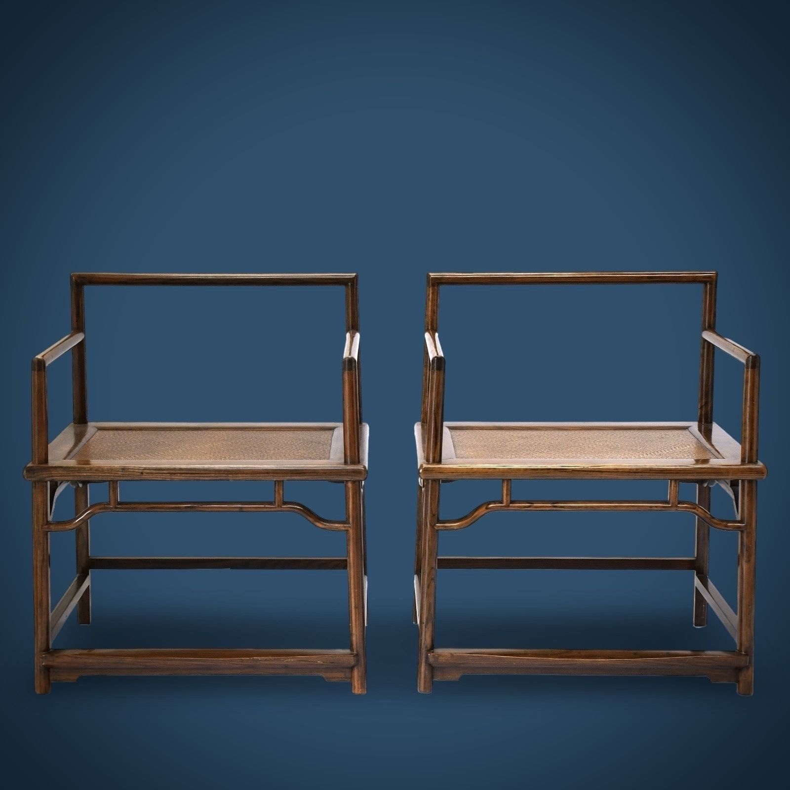 An Imposing Pair Of Chinese Elmwood Meditation Armchairs