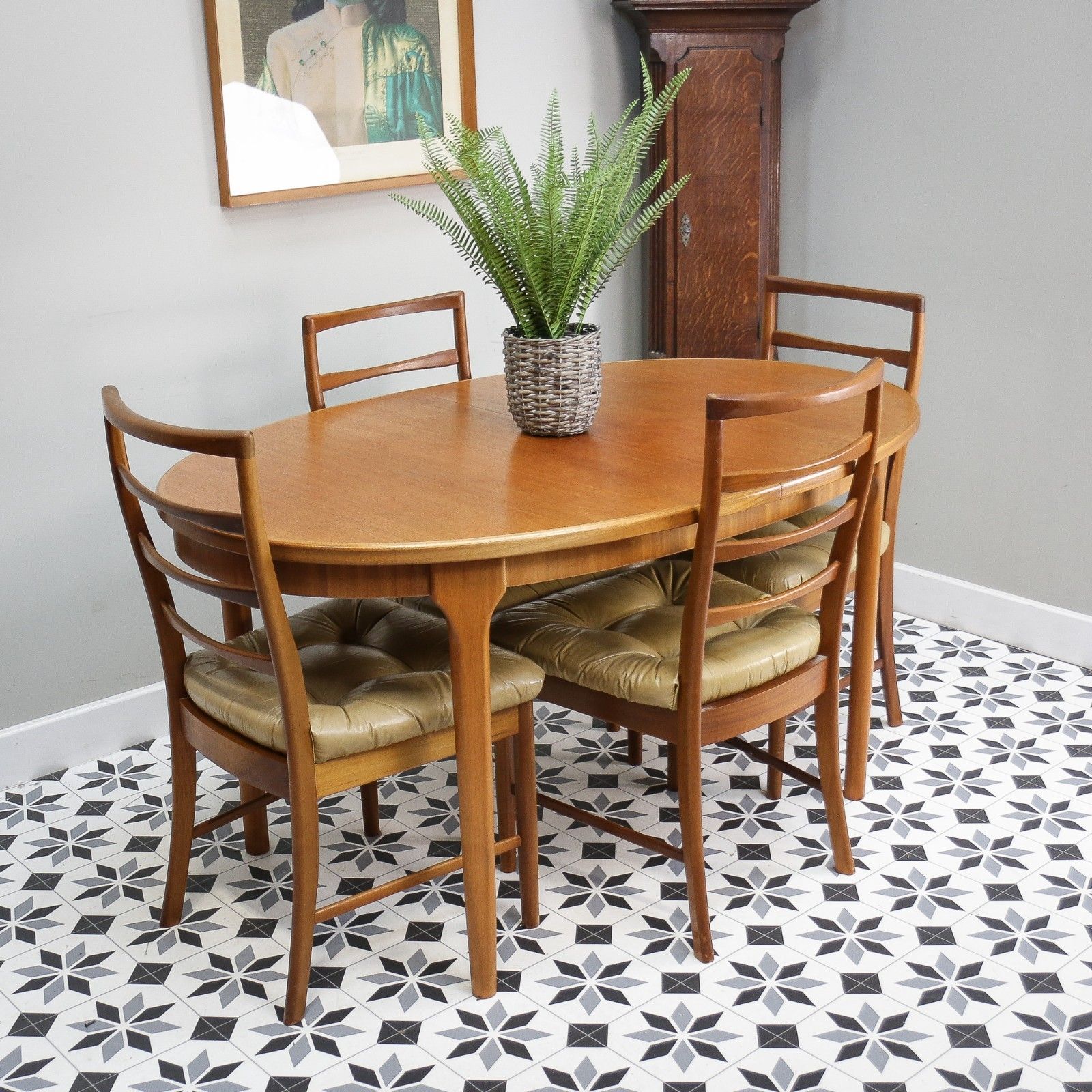 995.0 McIntosh Dining Table And Chairs In Teak. Table Extends 6 Standard Chairs photo