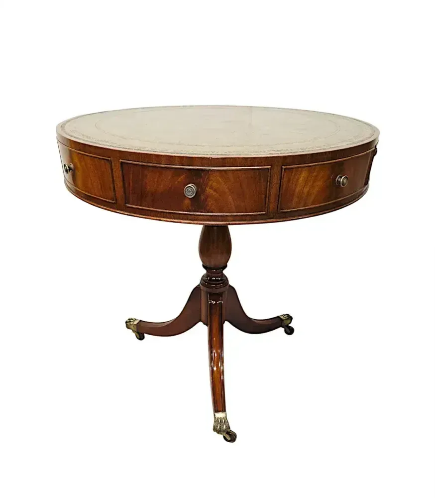 A Stunning Early 20th Century Leather Top Revolving Drum Table