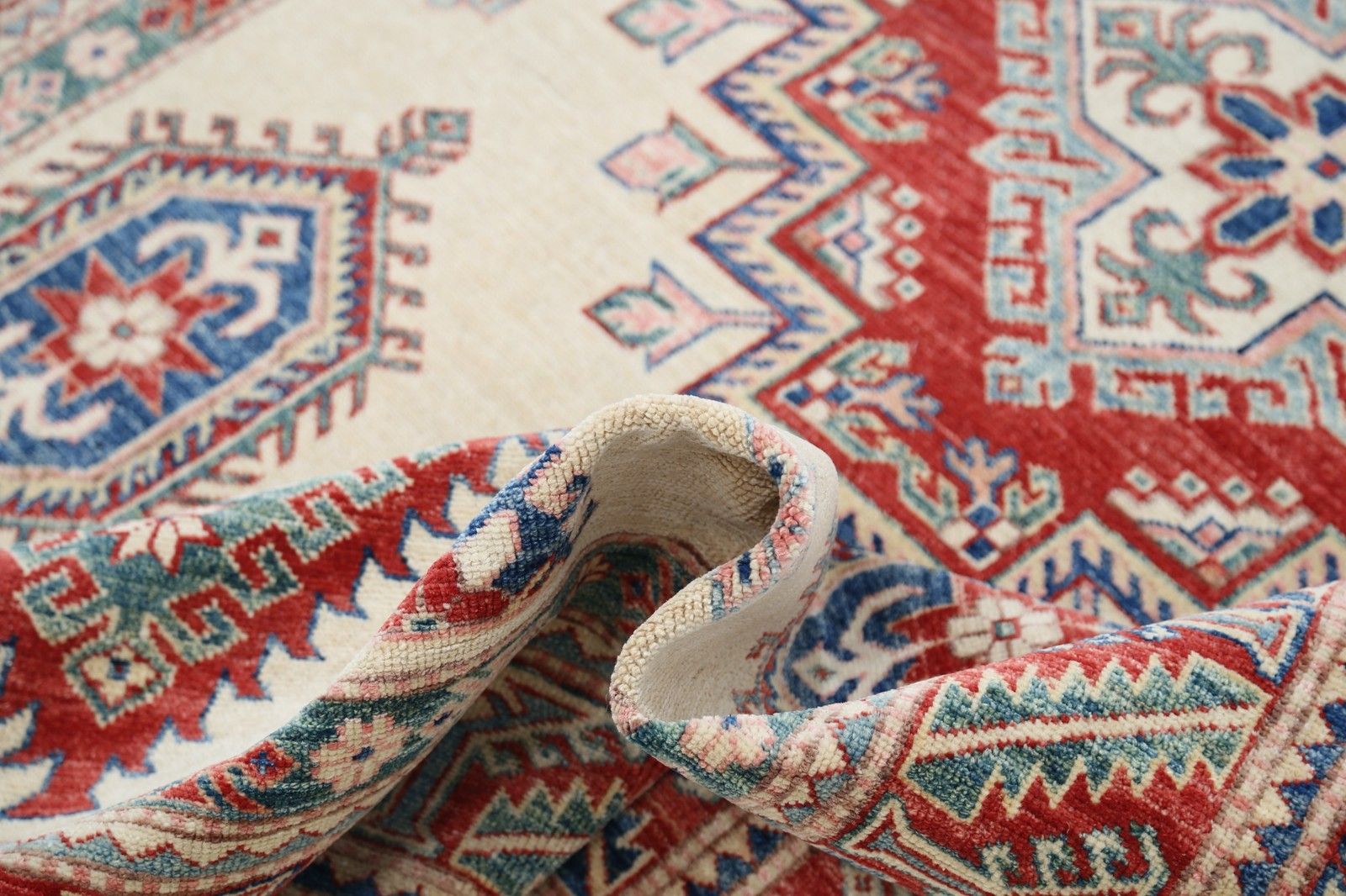 5,5 x 8,3 ft Handgeknoopt vloerkleed in rood, ivoor en marineblauw. Turks vloerkleed met geometrisch dessin photo vinterior