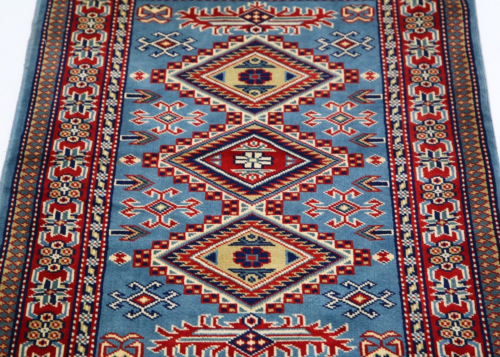 Handgemaakt wollen vloerkleed in blauw, rood en ivoor met geometrisch medaillonmotief, 2x3 ft photo 349.0