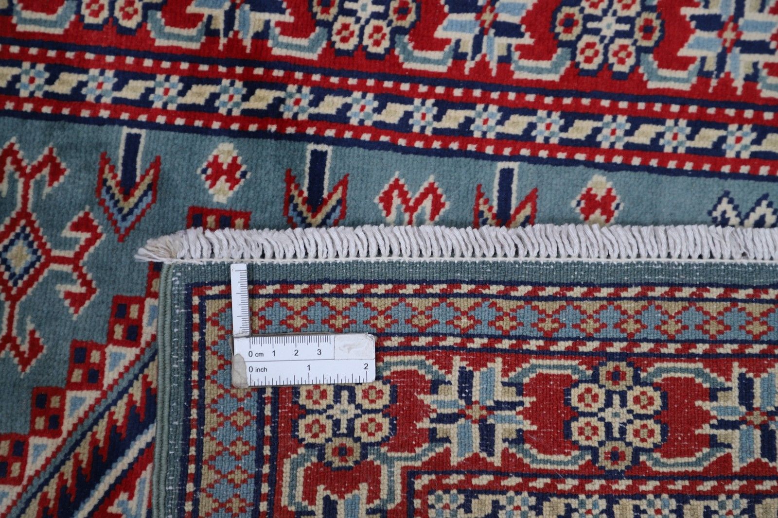 Tapis d'accent en laine fait main, bleu, rouge et ivoire, motif médaillon géométrique, 60 x 90 cm photo 349.0