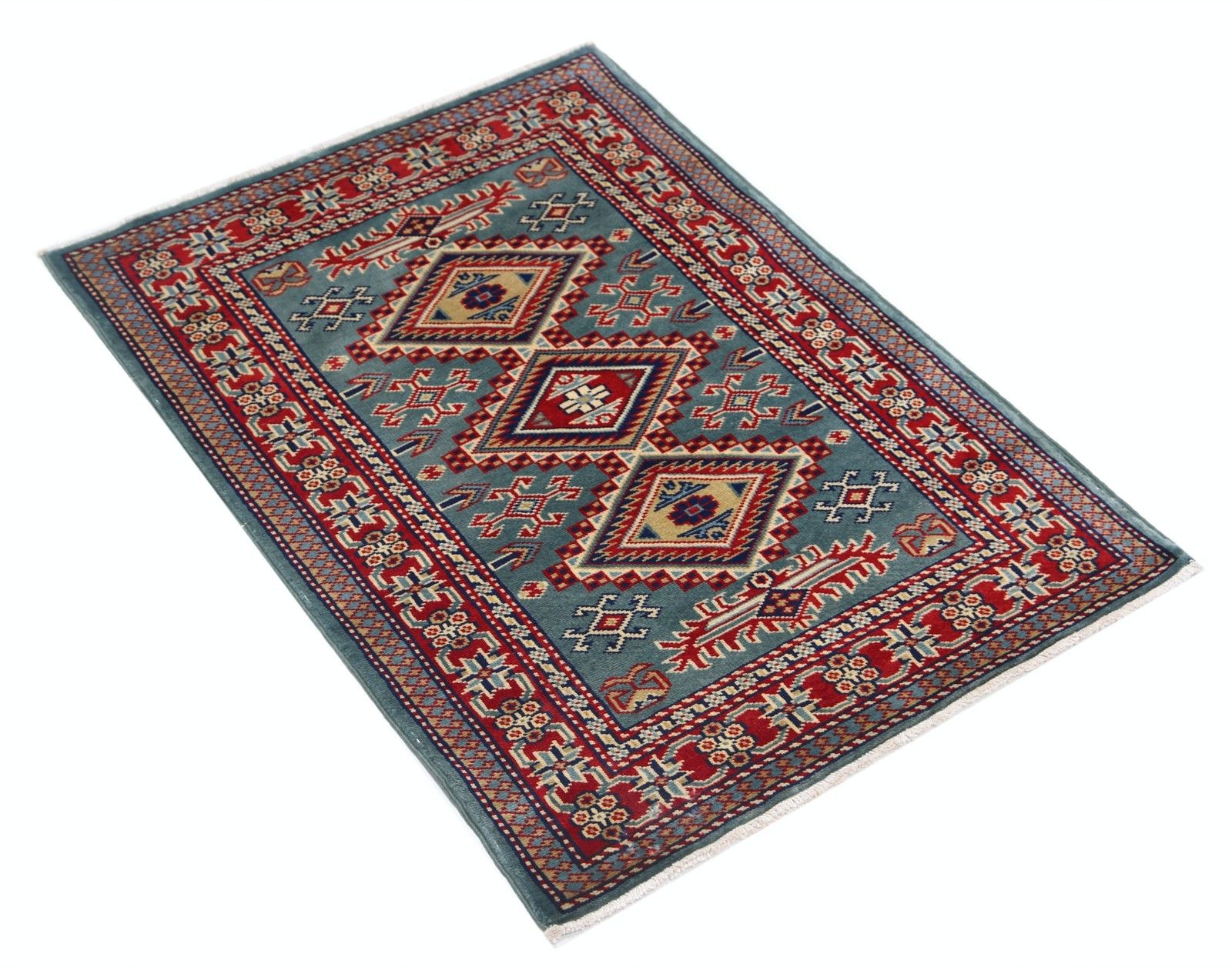 Handgeknoopt vloerkleed, blauw, rood en ivoor, met geometrisch medaillonmotief, 64 x 89 cm photo furniture
