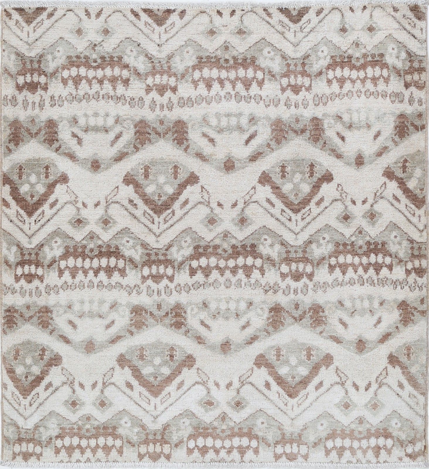 3x3,3 ft handgeknoopt wollen vloerkleed in ivoor en bruin. Accent rug met geometrisch dessin