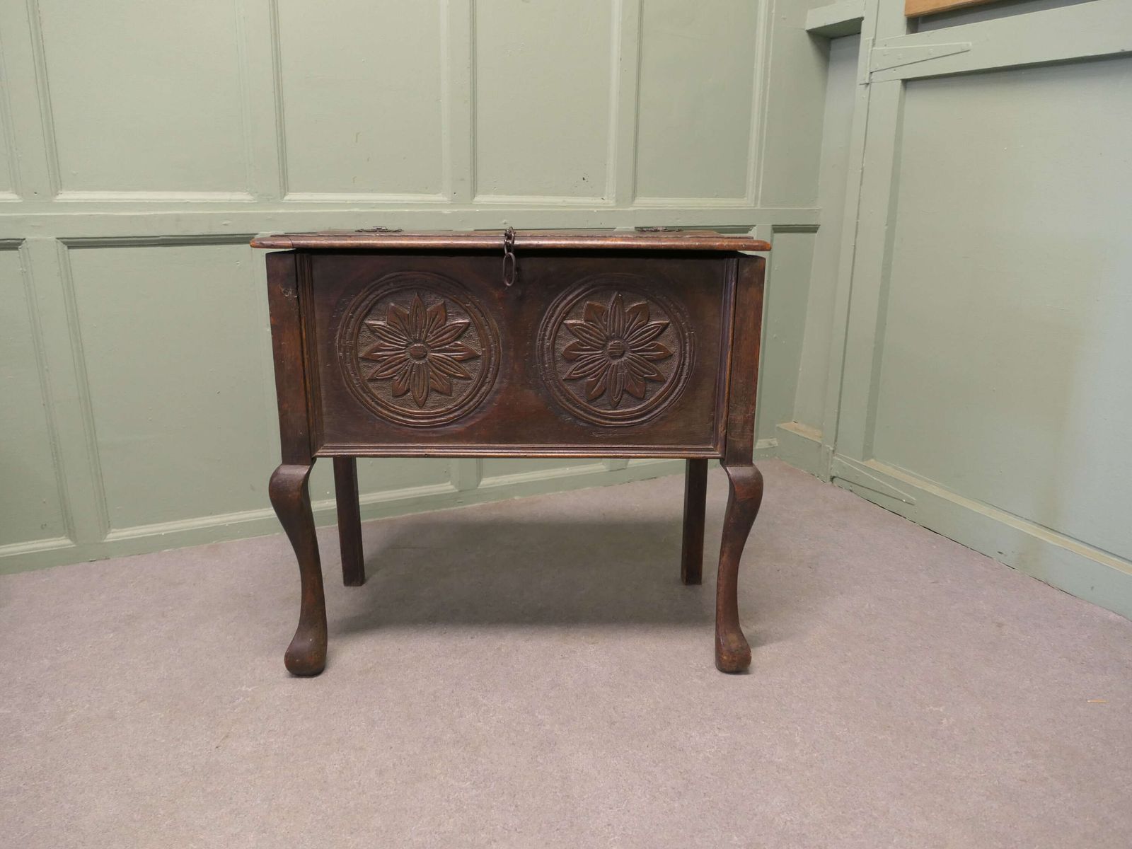 An Unusual 17th Century Carved Oak Coffer On Legs photo furniture
