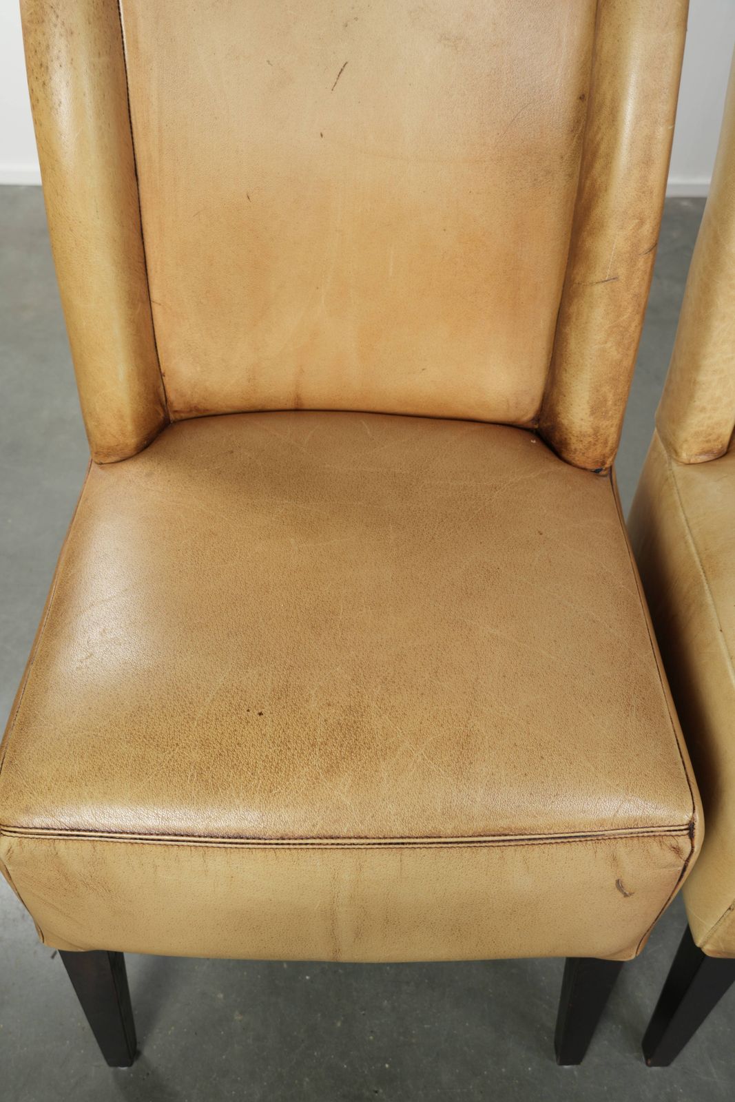 Luxury Set Of Four Cowhide Leather Dining Chairs With A Beautiful Light Color, Comfortable Seat, And A High Back photo vinterior