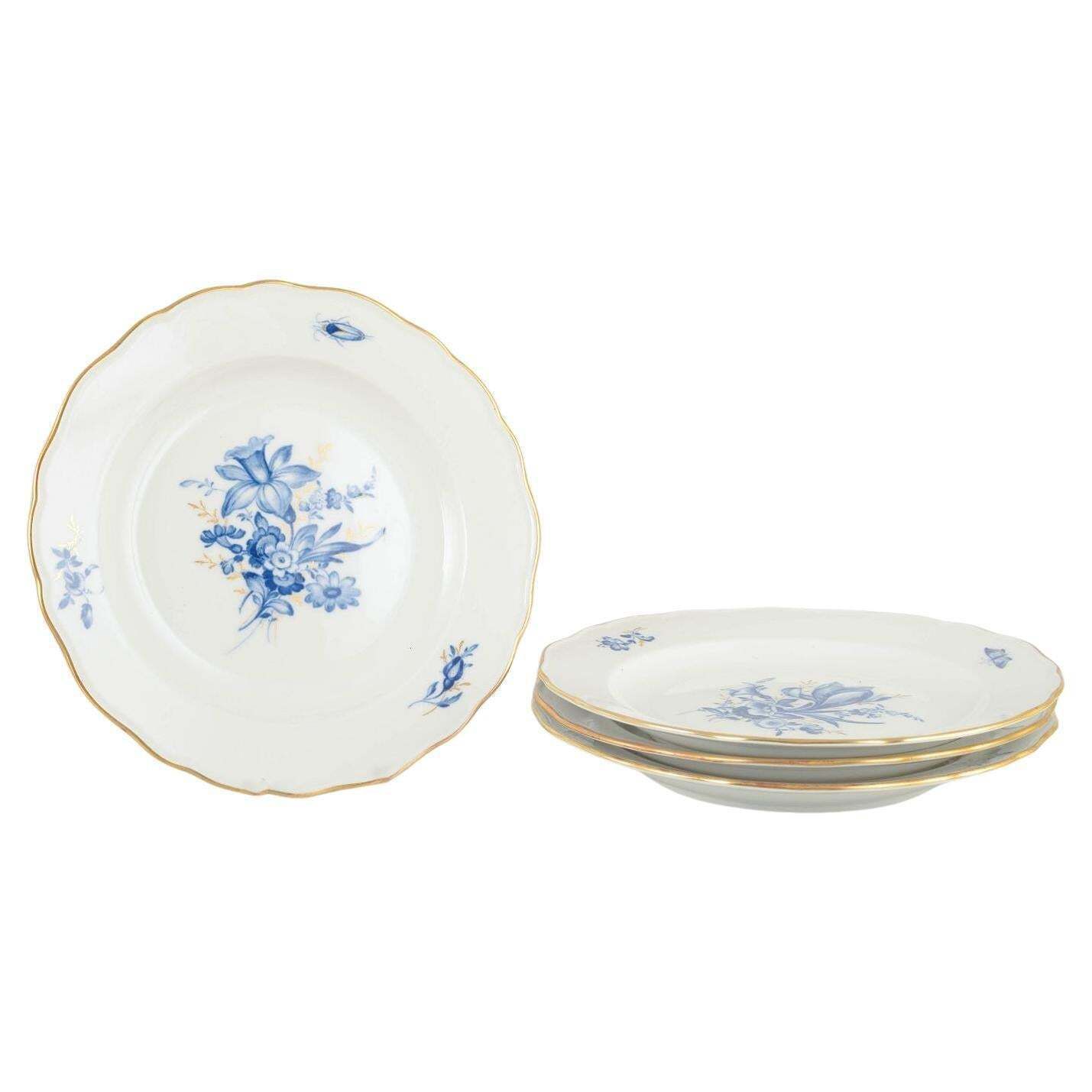 Meissen. 4 Porcelain Lunch Plates With Blue Floral Motifs And Gilt Rim.
