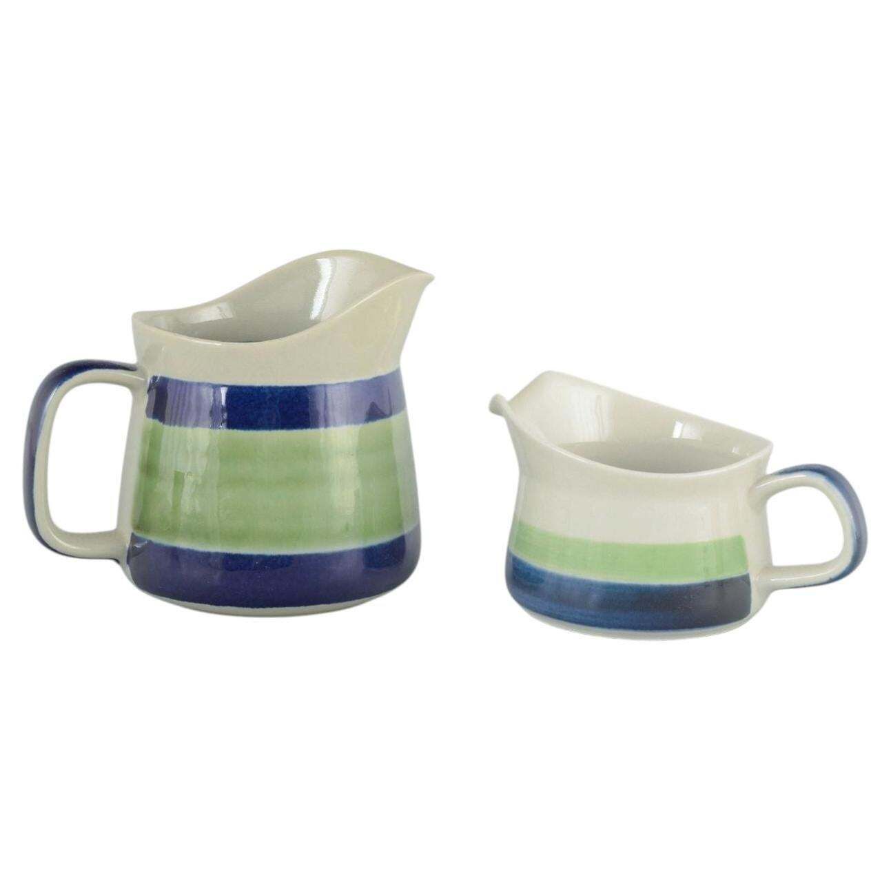 Rörstrand, Sweden “Lotta”. Two Jugs In Faience With White, Green And Blue Glaze.
