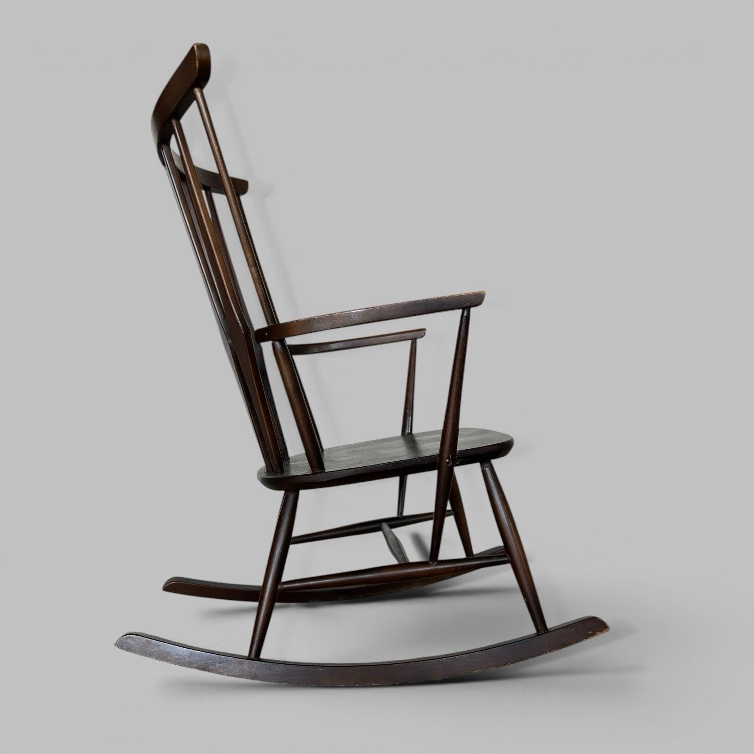 Mid Century Wooden Rocking Chair With Spindle Back