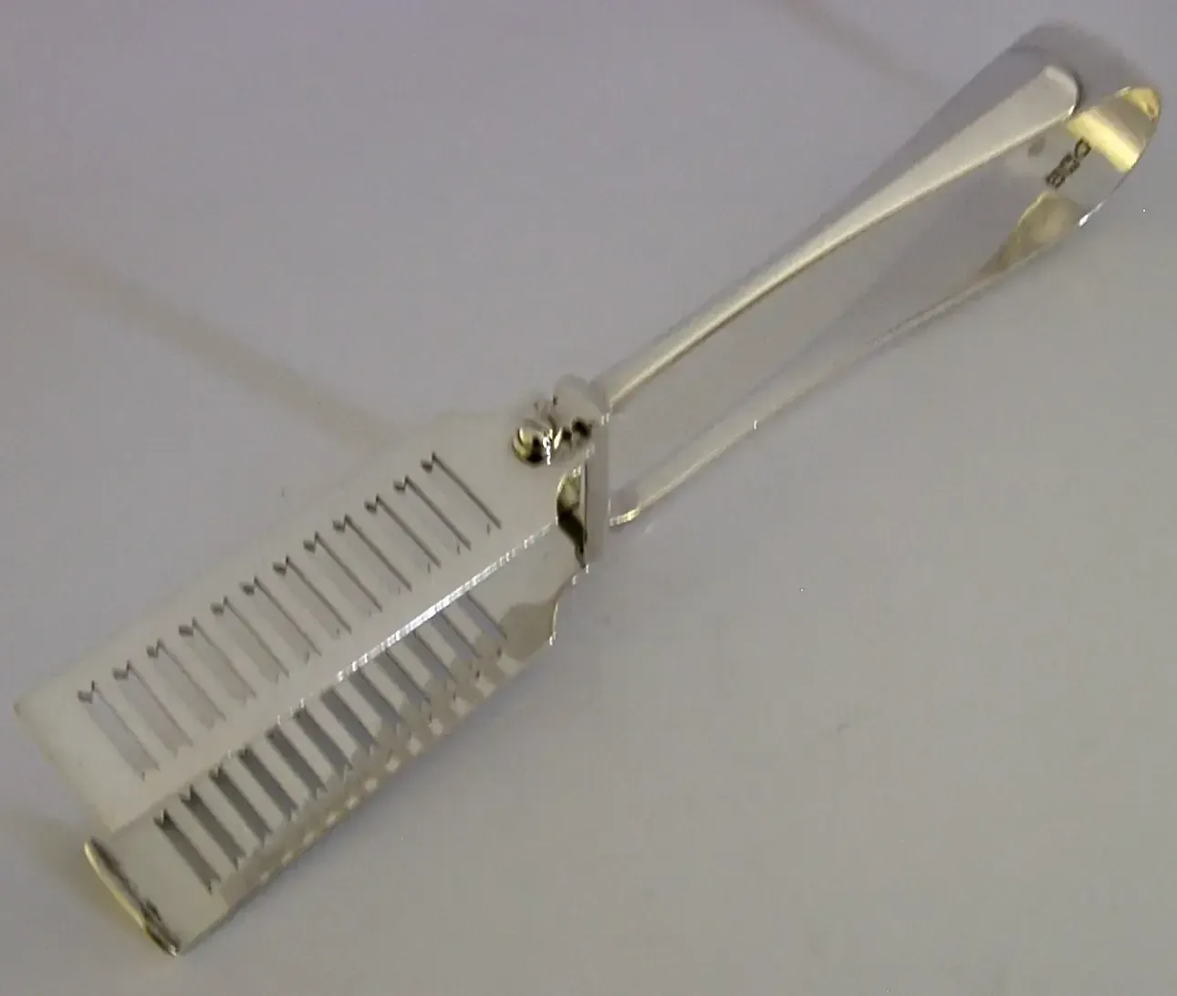 Pince de service édouardienne aux armes de la famille Taylor, argent sterling, 1903, 136 g photo vinterior