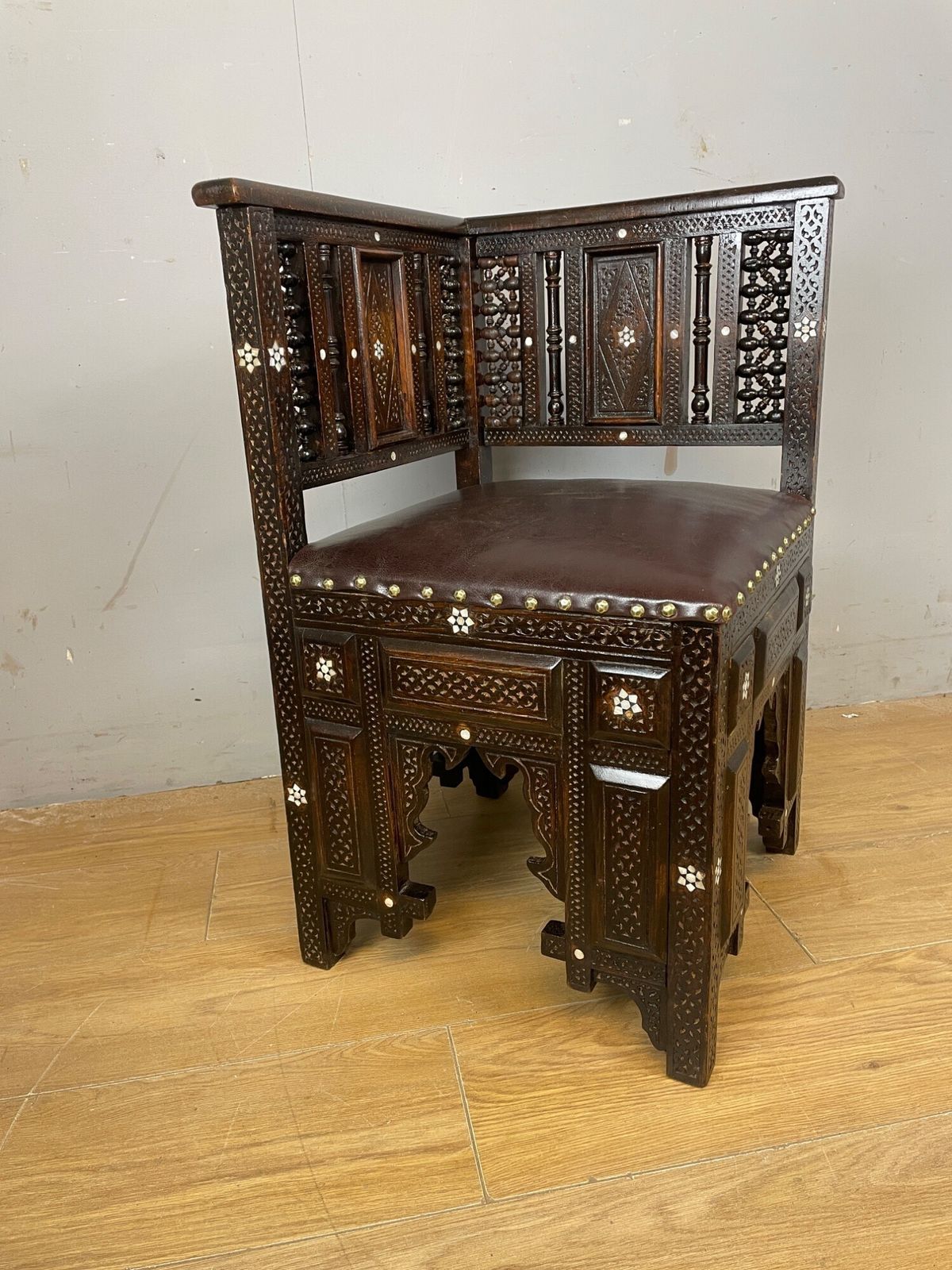 C19th Inlaid Carved Corner Chair With Mashrabiya Panels Attributed To Liberty And Co photo for sale