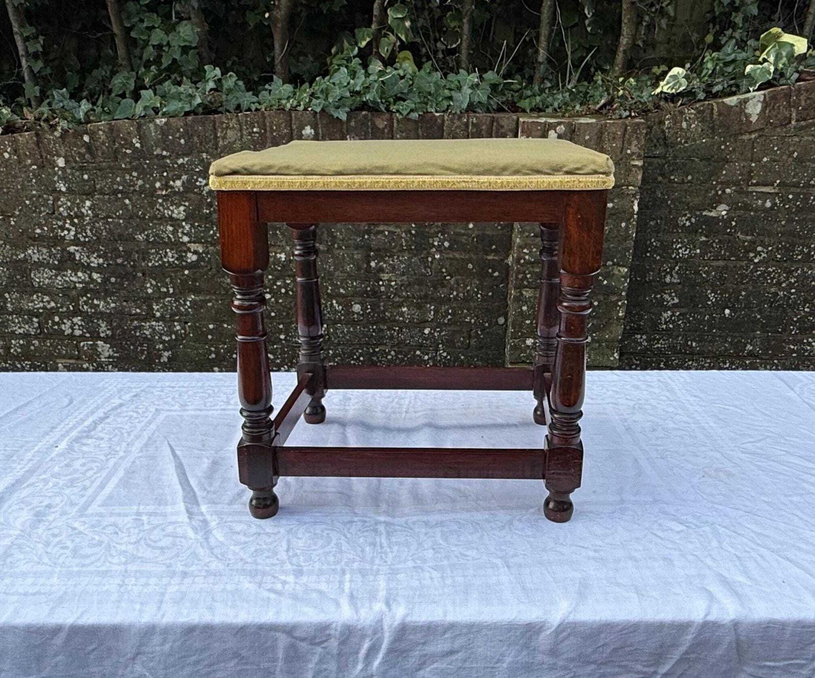 Vintage Upholstered Mahogany Footstool Or Occasional, Vanity Stool With Turned Legs And Green Velvet Like Seat