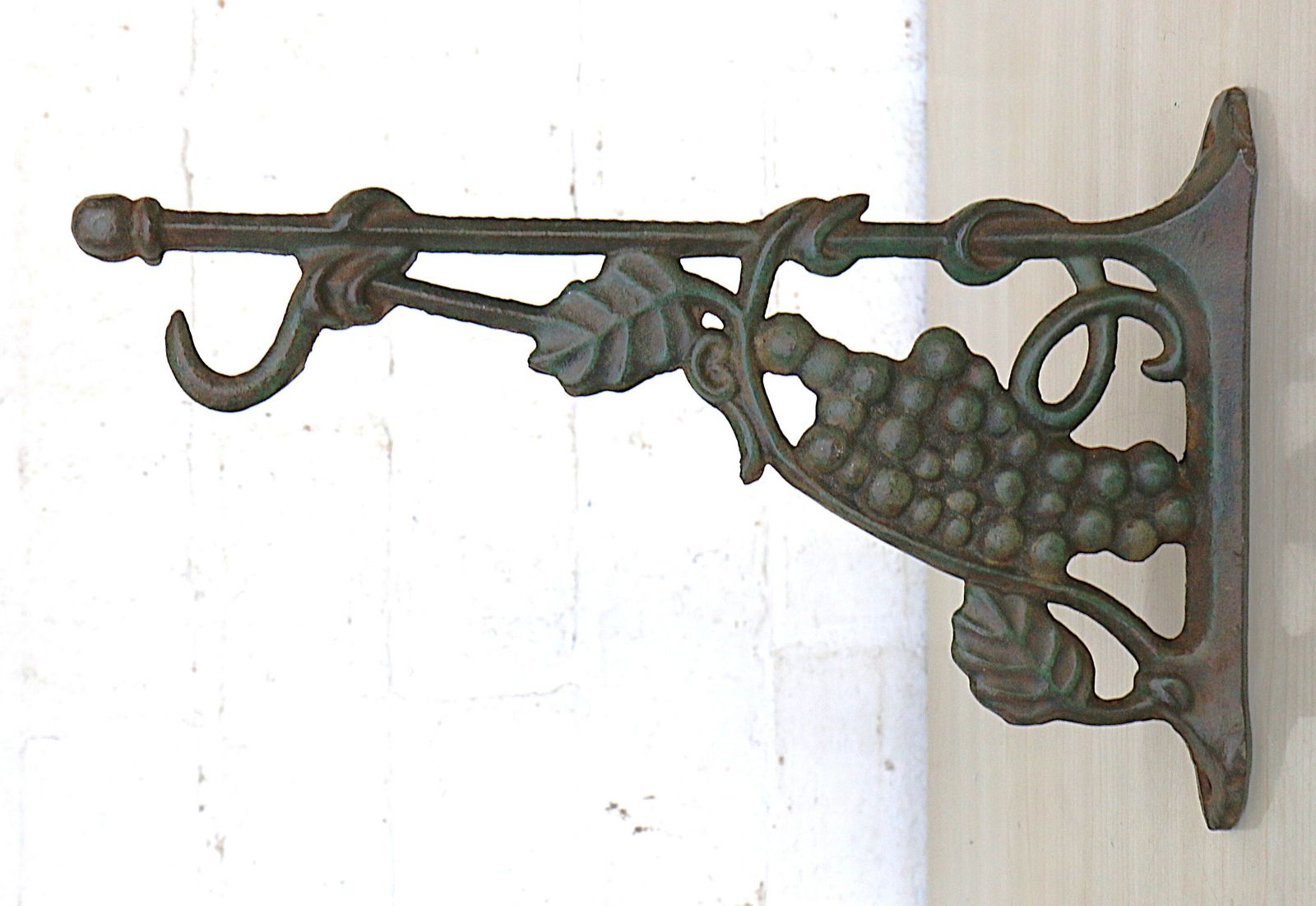 photo furniture Three Vintage French Hanging Basket Bracket Hooks Vineyard Themed Cast Iron