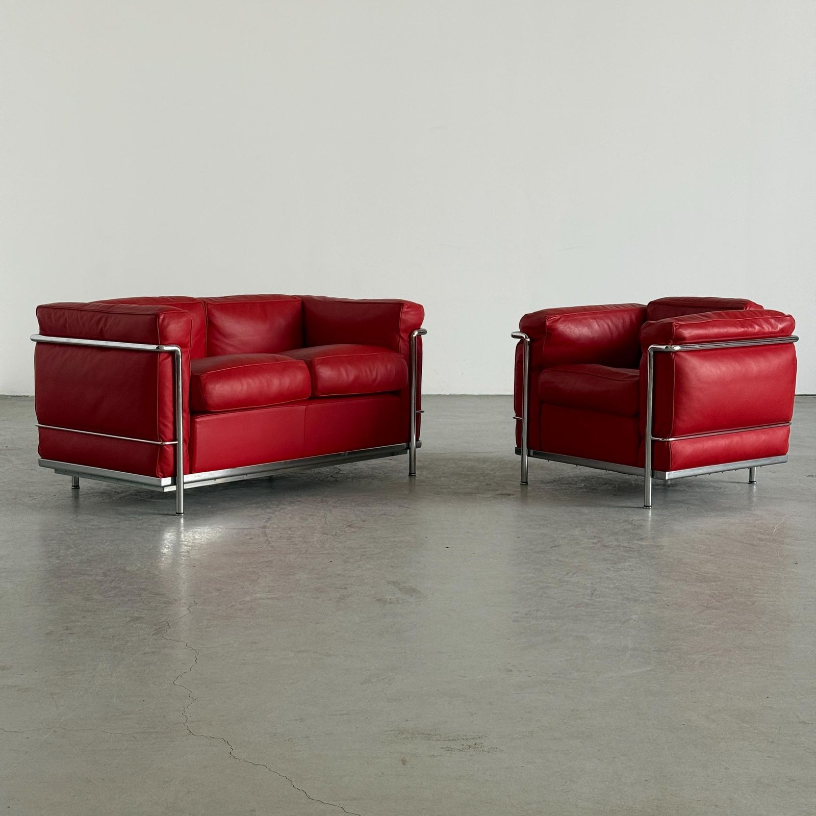 Iconic ‘Lc2’ Two Seater Sofa By Le Corbusier, Charlotte Perriand And Pierre Jeanneret For Cassina, Red Leather & Chromed Steel photo for sale