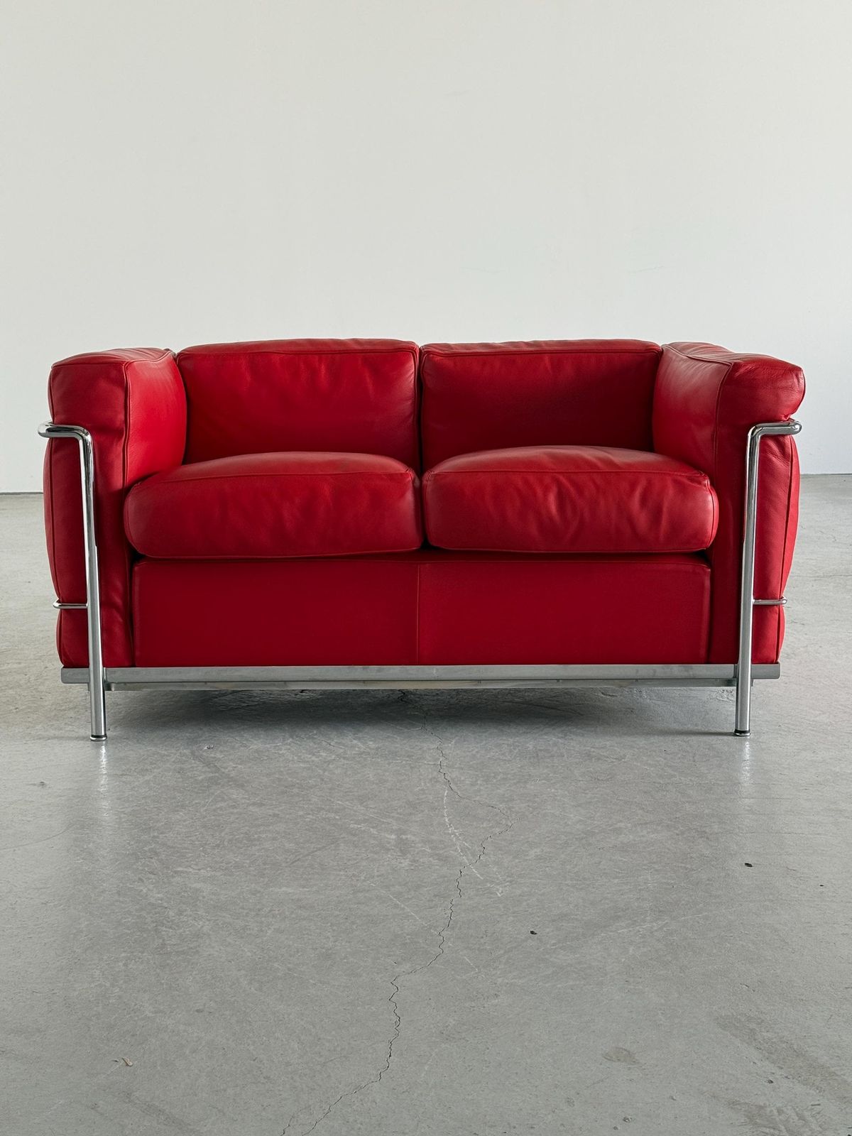 Iconic ‘Lc2’ Two Seater Sofa By Le Corbusier, Charlotte Perriand And Pierre Jeanneret For Cassina, Red Leather & Chromed Steel photo Furniture