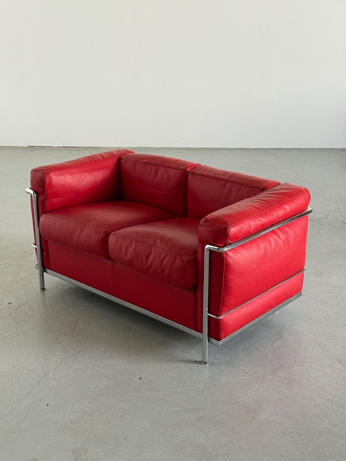 Iconic ‘Lc2’ Two Seater Sofa By Le Corbusier, Charlotte Perriand And Pierre Jeanneret For Cassina, Red Leather & Chromed Steel photo buy