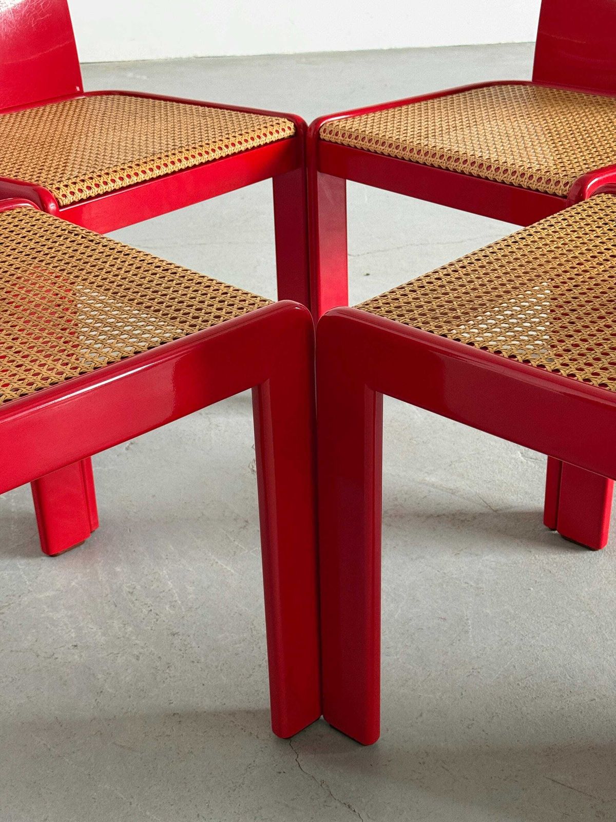 photo for sale Set Of 4 Elegant Italian Mid Century Chairs By Pierluigi Molinari For Pozzi Milano, Red Lacquered Wood And Cane, 1970s