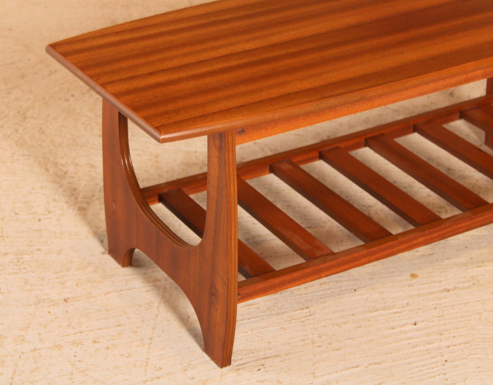 Mid Century Mahogany Coffee Table With A Magazine Rack, Circa 1960s photo for sale