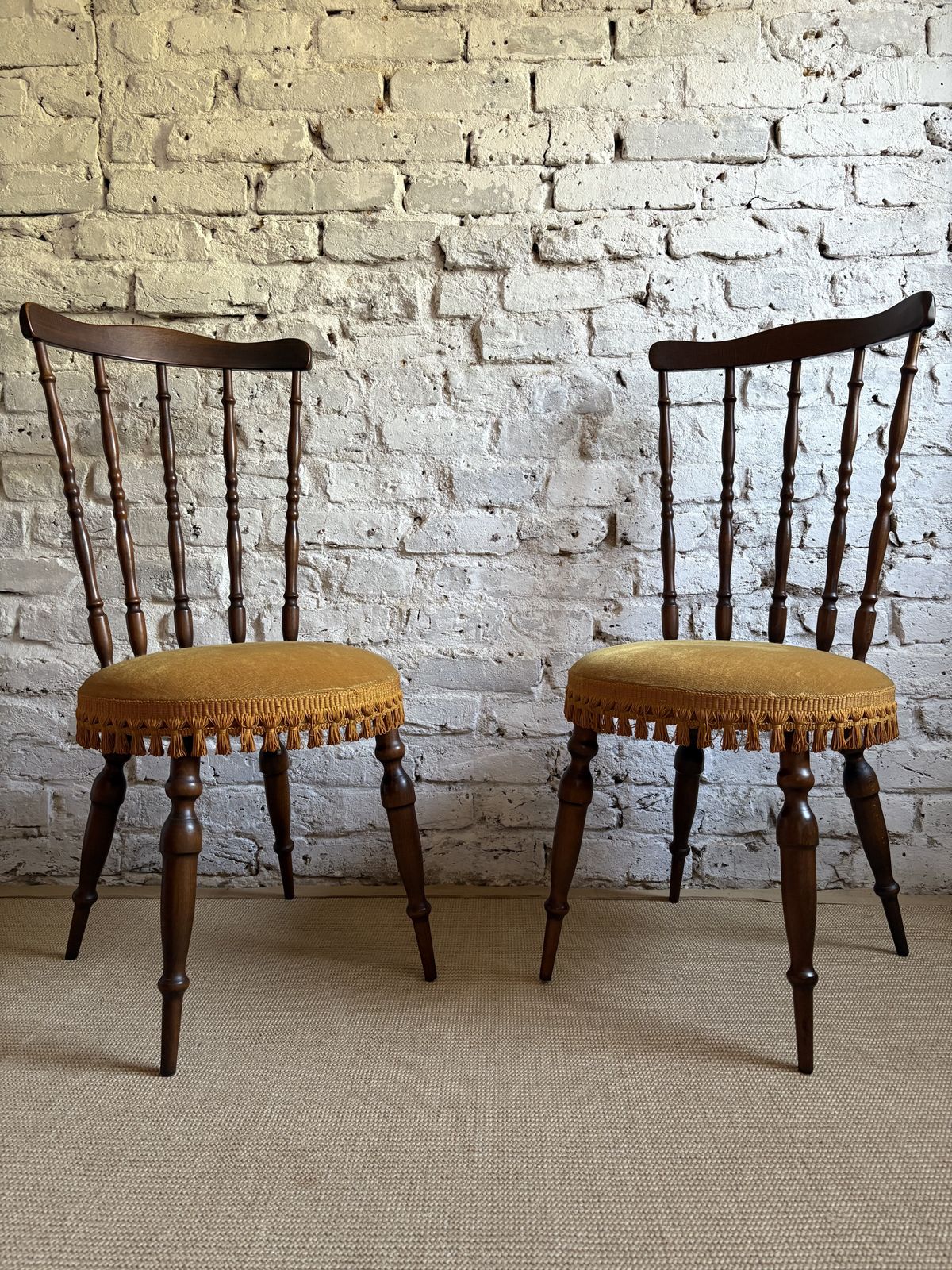 A Pair Of French Upholstered Occasional Chairs With Tassel Trim