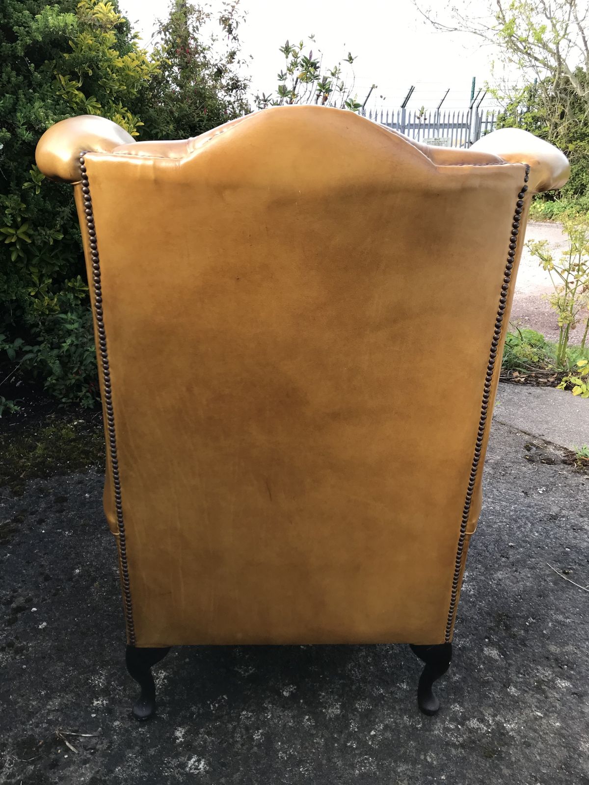 389.0 Vintage Hand Dyed Ochre Leather Chesterfield Wing Armchair photo