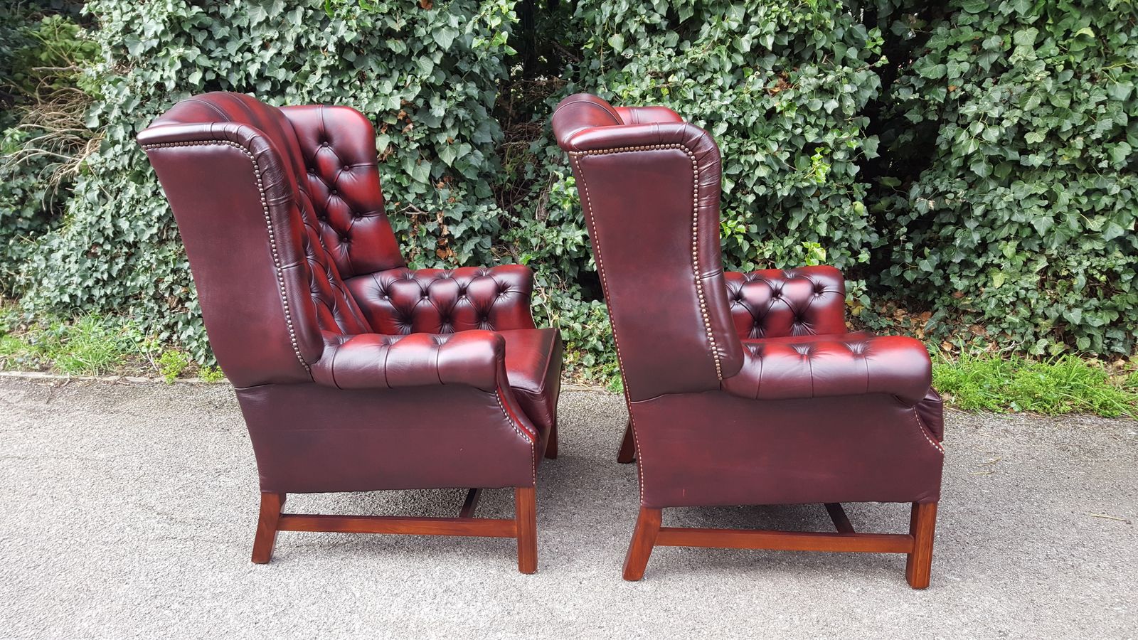 photo furniture Matching Pair Of Mahogany Red Leather Chesterfield Wingback Armchairs