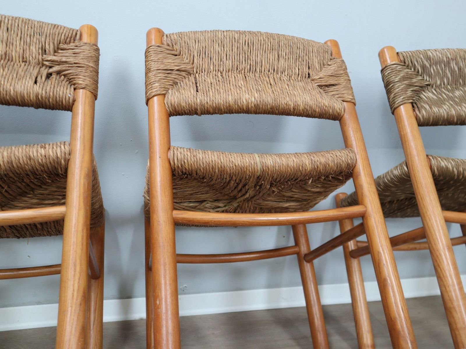photo for sale Set Of 8 Chairs 1960s Charlotte Perriand Style Woven Straw & Wood