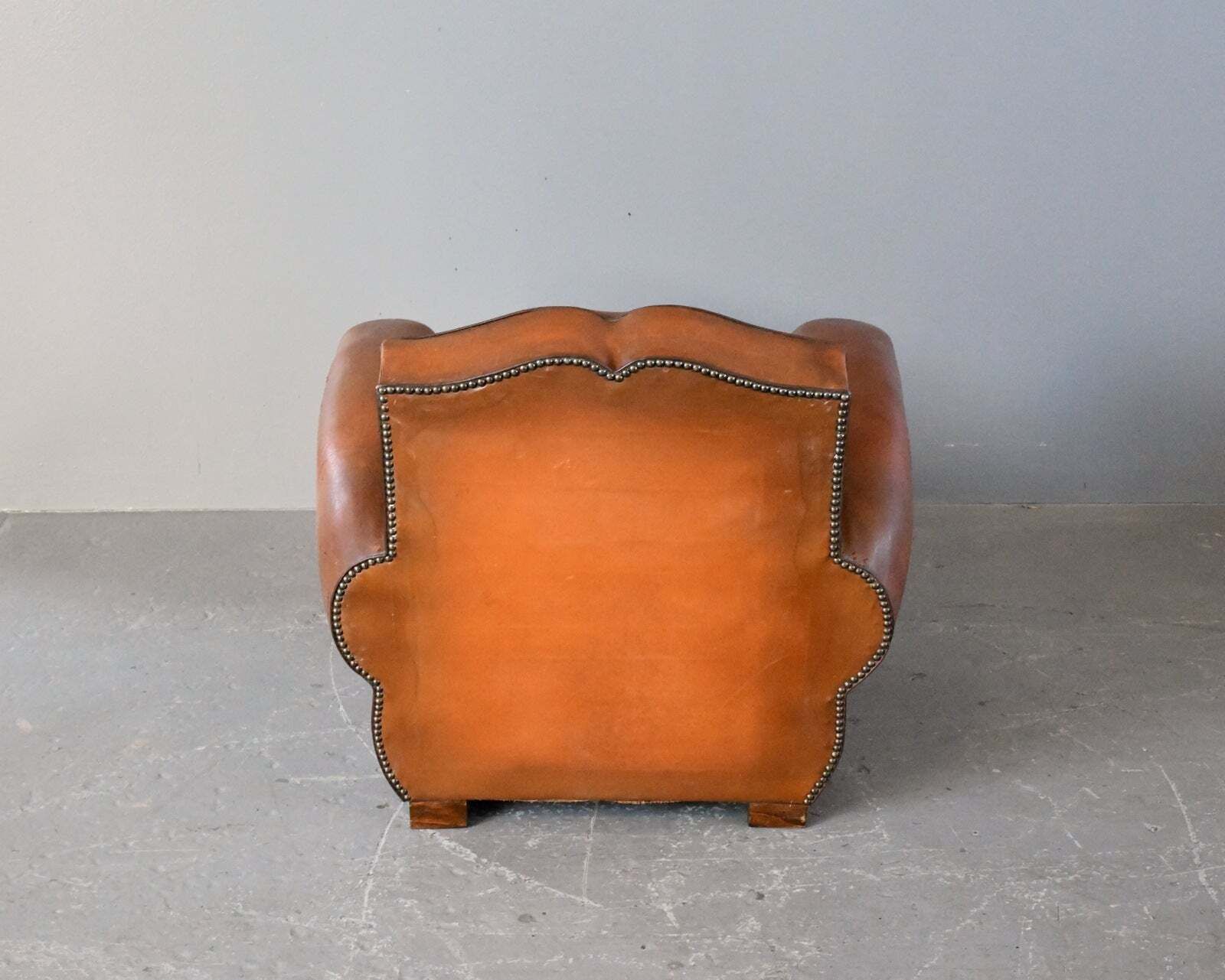895.0 French Moustache Backed Art Deco Leather Armchair Circa 1920s photo