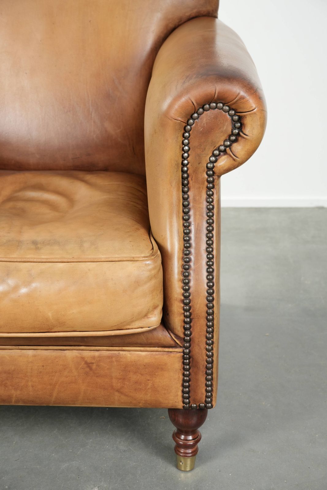 photo furniture Beautiful And Comfortable Armchair Made Of Cowhide Leather With A Characterful And Charming English Look.