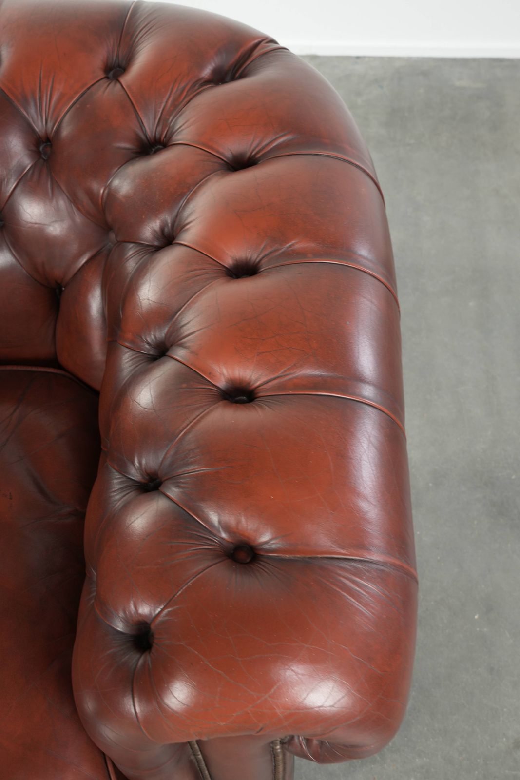 Beautiful Red/Brown Cowhide Chesterfield Armchair In A Classic English Style With A Stunning Appearance. photo vintage